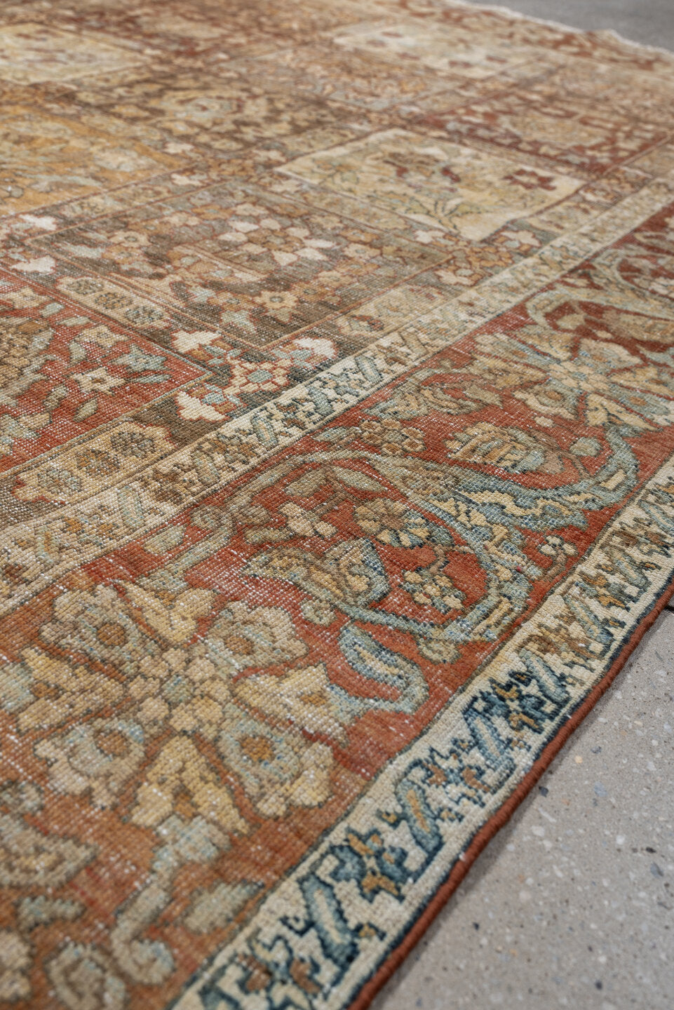 4' x 6' one-of-a-kind handmade antique Baktiary small size rug. Color palette: terracotta, ivory, pale blue, taupe, camel