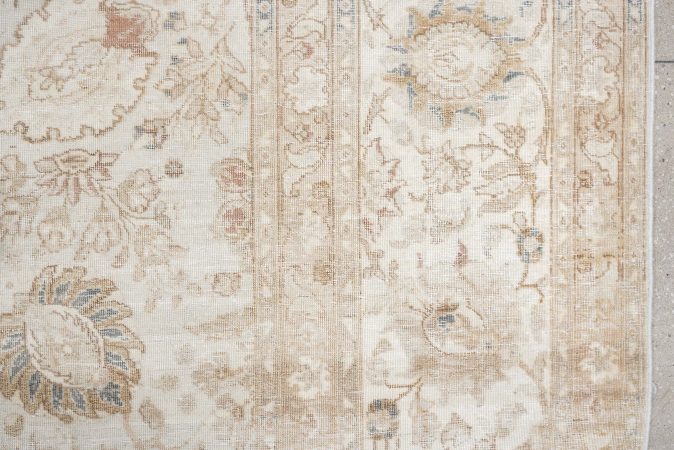 9' x 18' one-of-a-kind handmade antique Tabriz rug. Color palette: ivory, taupe, beige, camel, pale blue, sage, soft gold