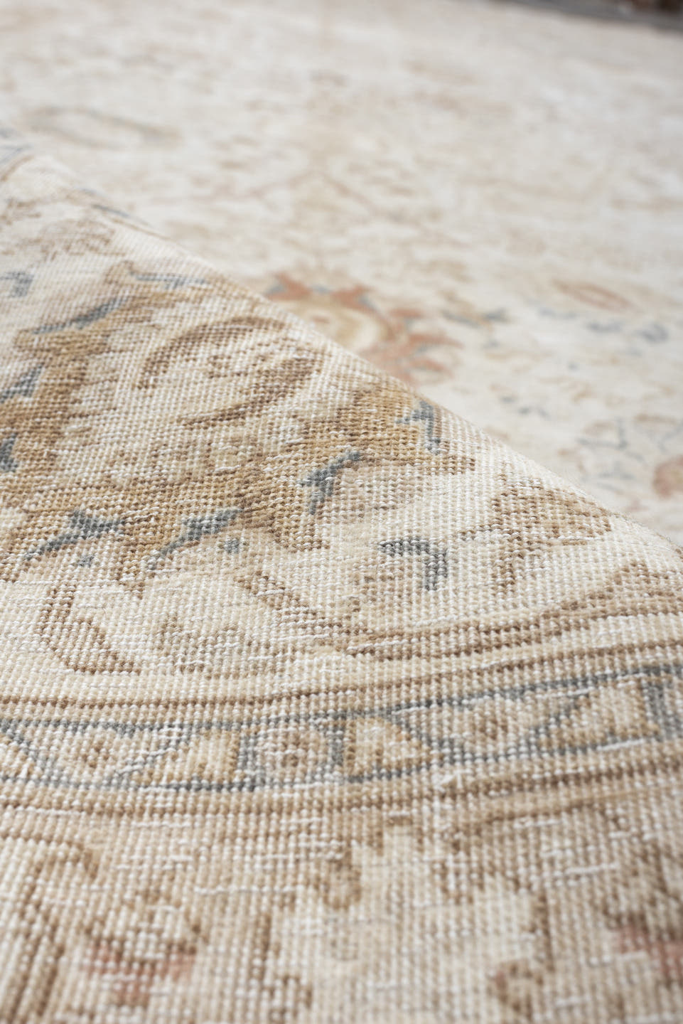 9' x 18' one-of-a-kind handmade antique Tabriz rug. Color palette: ivory, taupe, beige, camel, pale blue, sage, soft gold