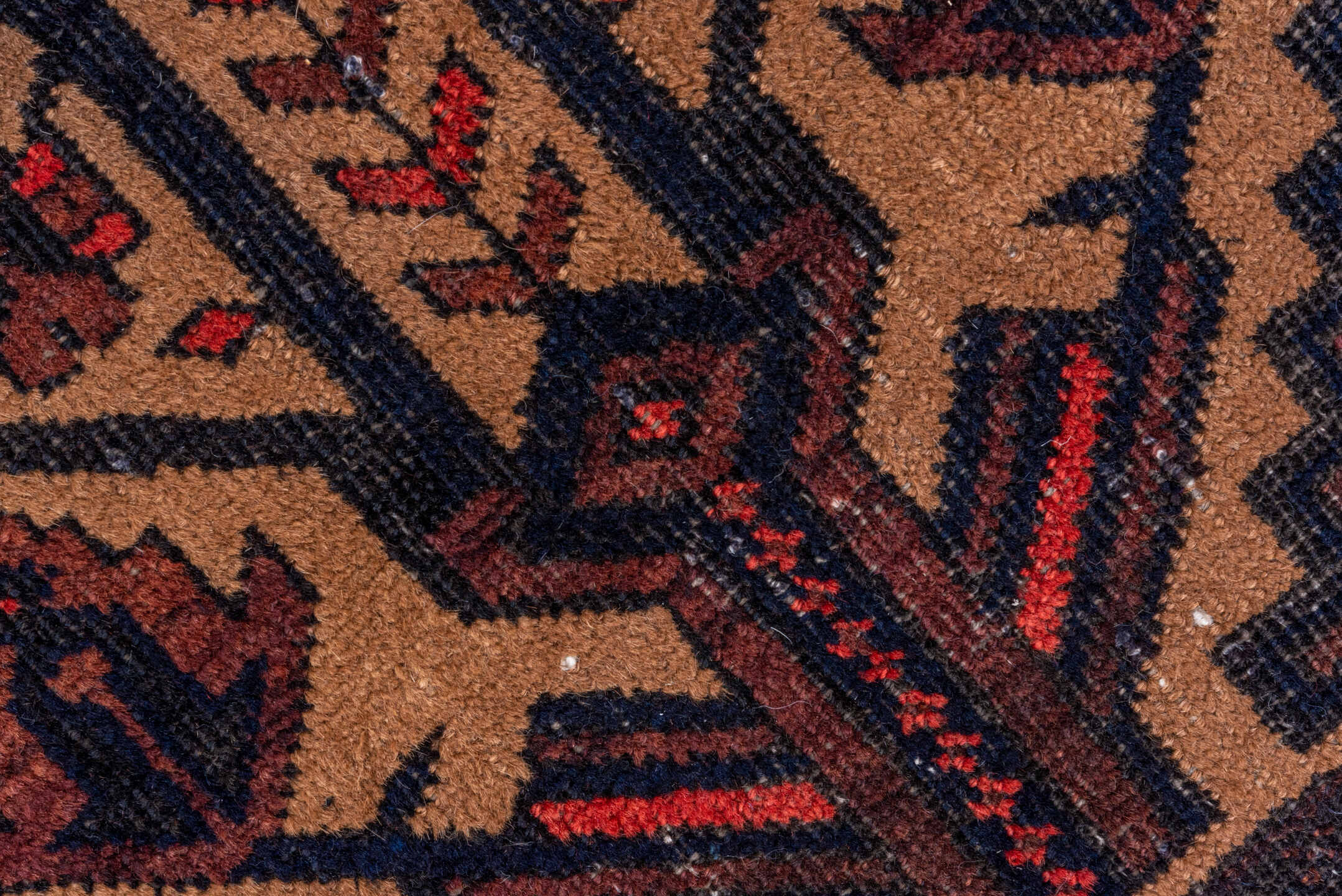 3' x 5' one-of-a-kind handmade antique Belouch small size rug. Color palette: crimson, ivory, navy, charcoal, rust, brown