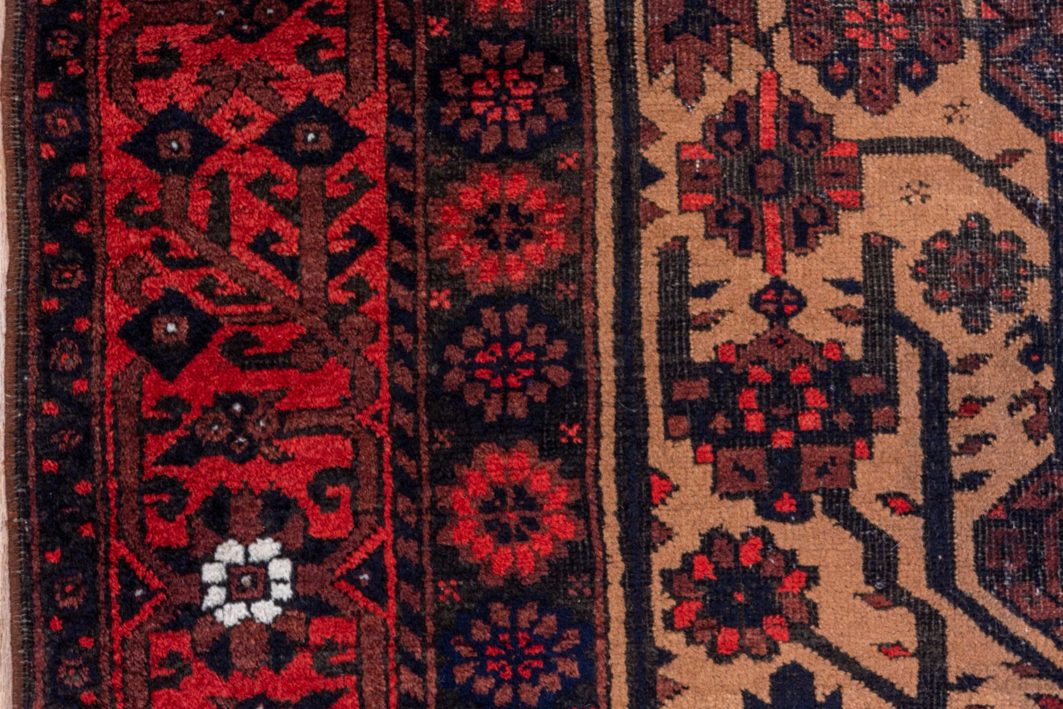 3' x 5' one-of-a-kind handmade antique Belouch small size rug. Color palette: crimson, ivory, navy, charcoal, rust, brown