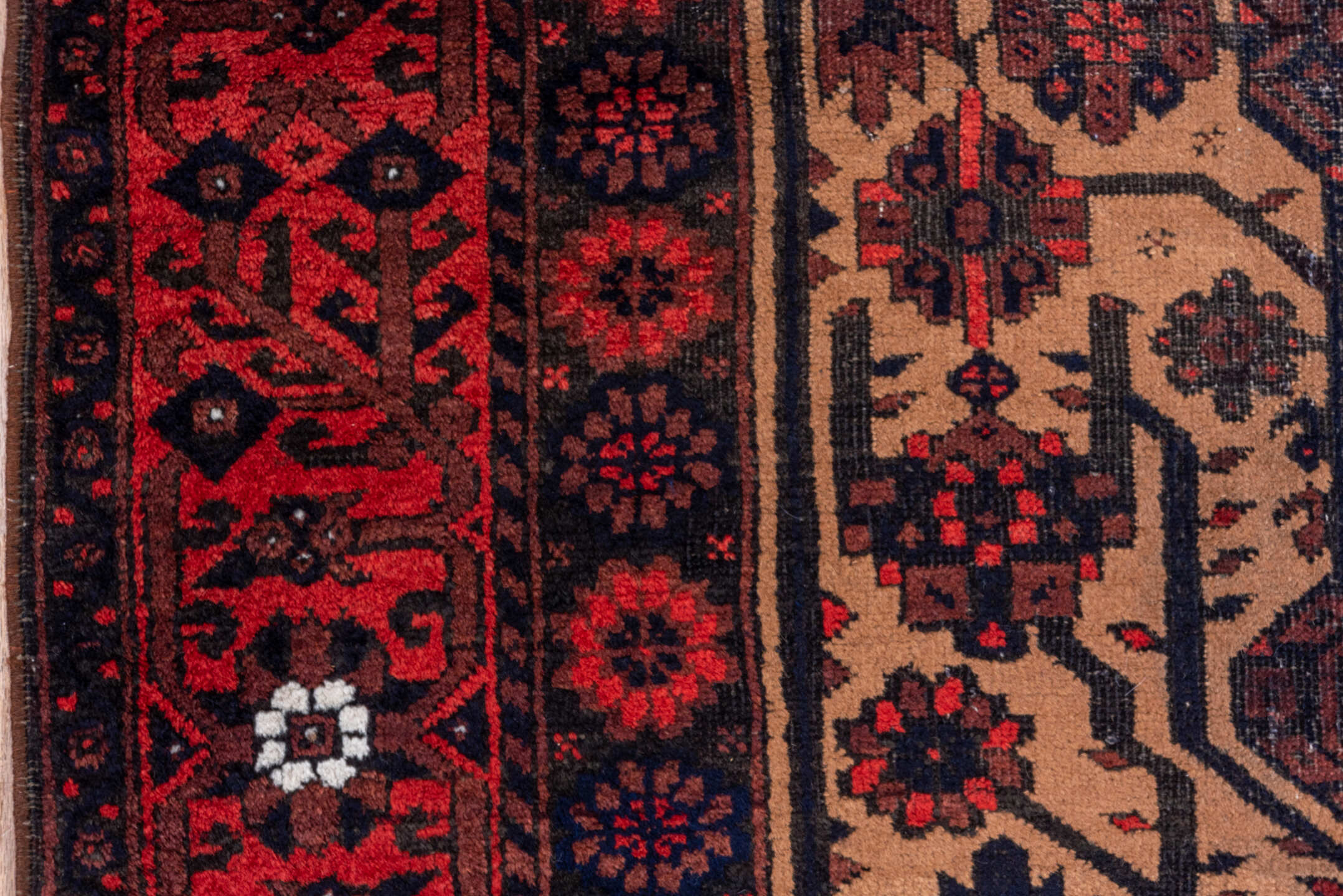 3' x 5' one-of-a-kind handmade antique Belouch small size rug. Color palette: crimson, ivory, navy, charcoal, rust, brown