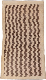 3' x 6' one-of-a-kind handmade vintage Tulu small size rug. Color palette: ivory, brown, taupe, beige, gray