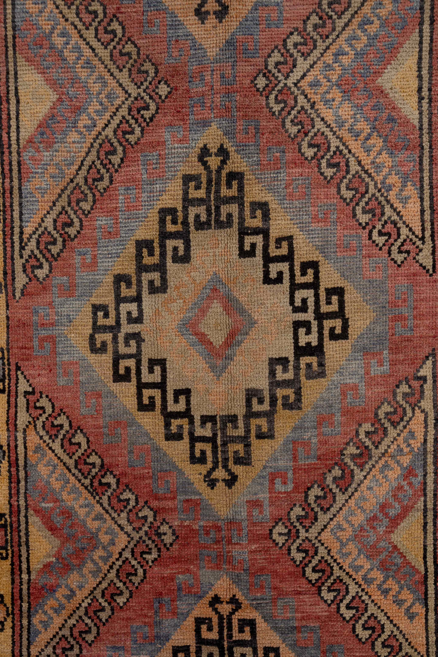 4' x 10' one-of-a-kind handmade vintage Oushak runner rug. Color palette: camel, rust, blue, ivory, charcoal, rose, taupe