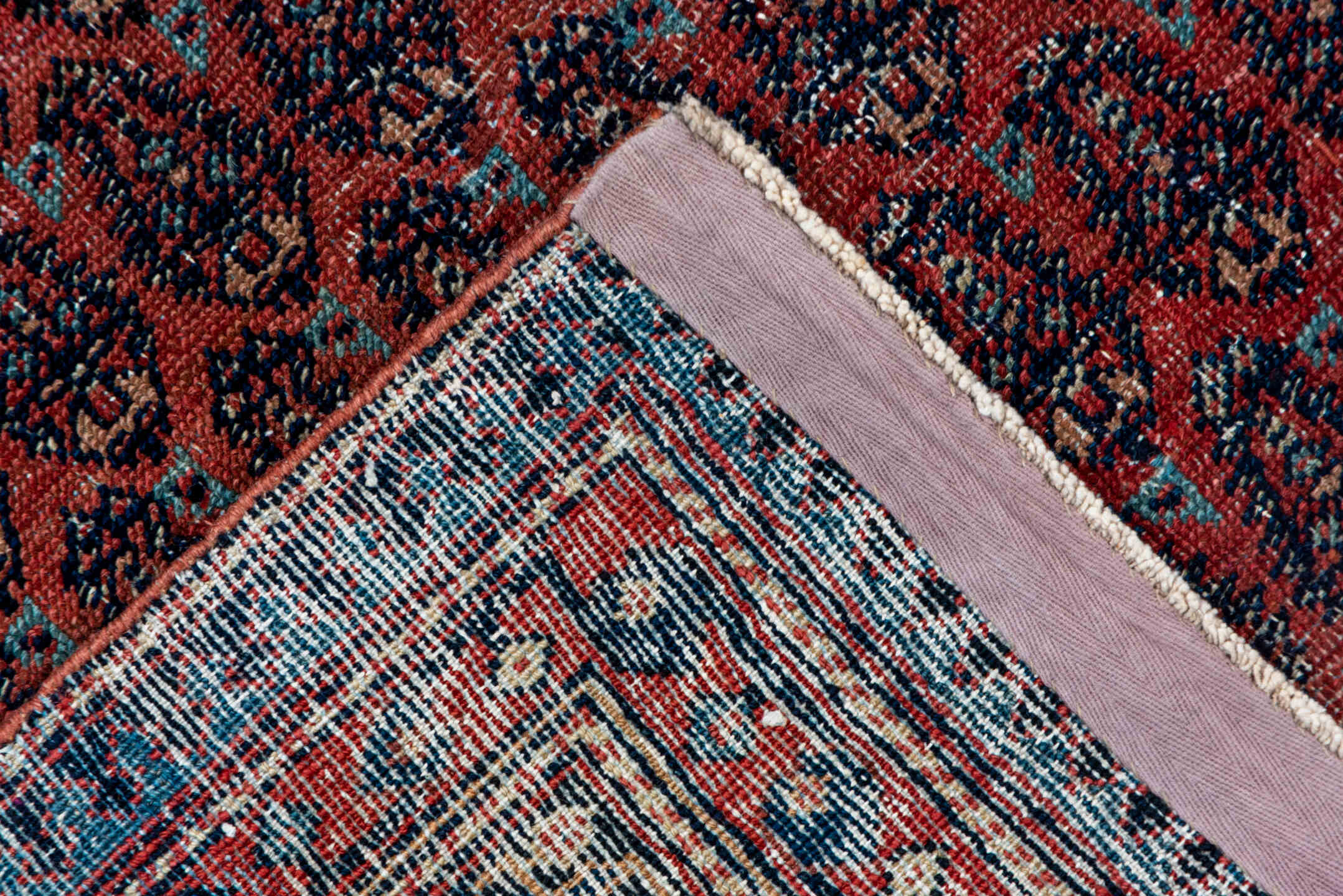 5' x 12' one-of-a-kind handmade antique Saraband rug. Color palette: rust, ivory, navy, burgundy, slate, rose, charcoal