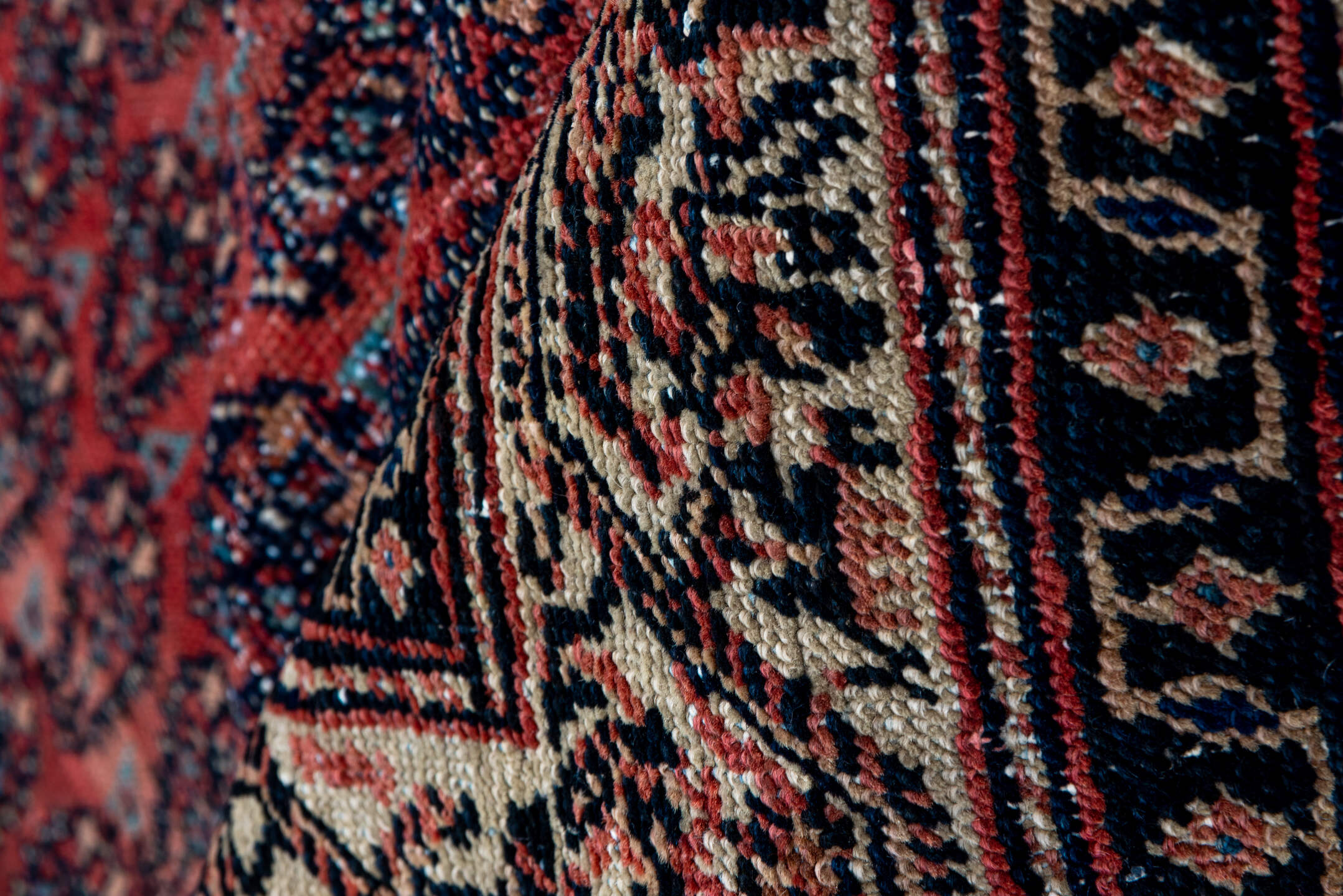 5' x 12' one-of-a-kind handmade antique Saraband rug. Color palette: rust, ivory, navy, burgundy, slate, rose, charcoal