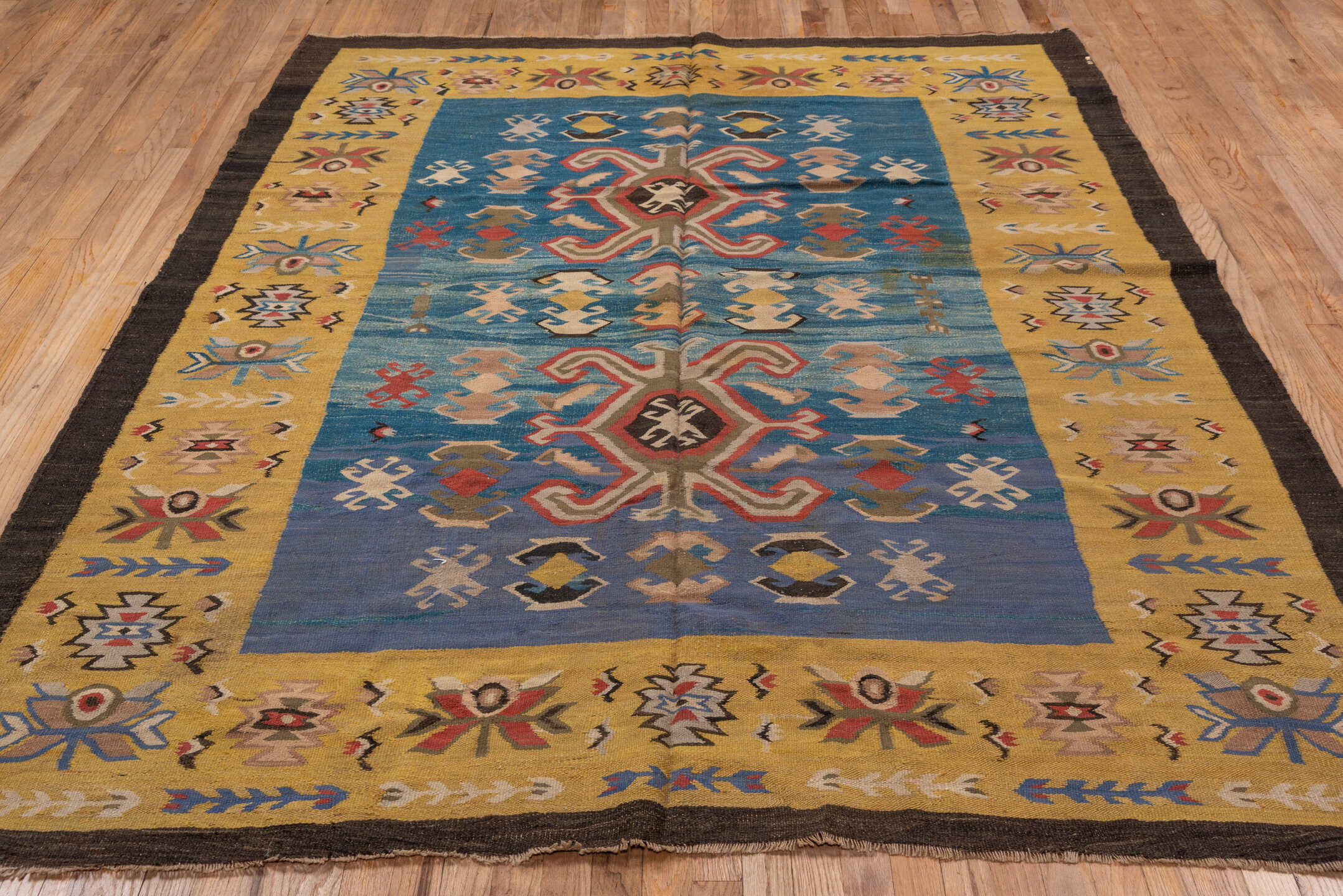 6' x 8' one-of-a-kind handmade vintage Besserabian medium size rug. Color palette: arapawa, black, blue, brown, gray