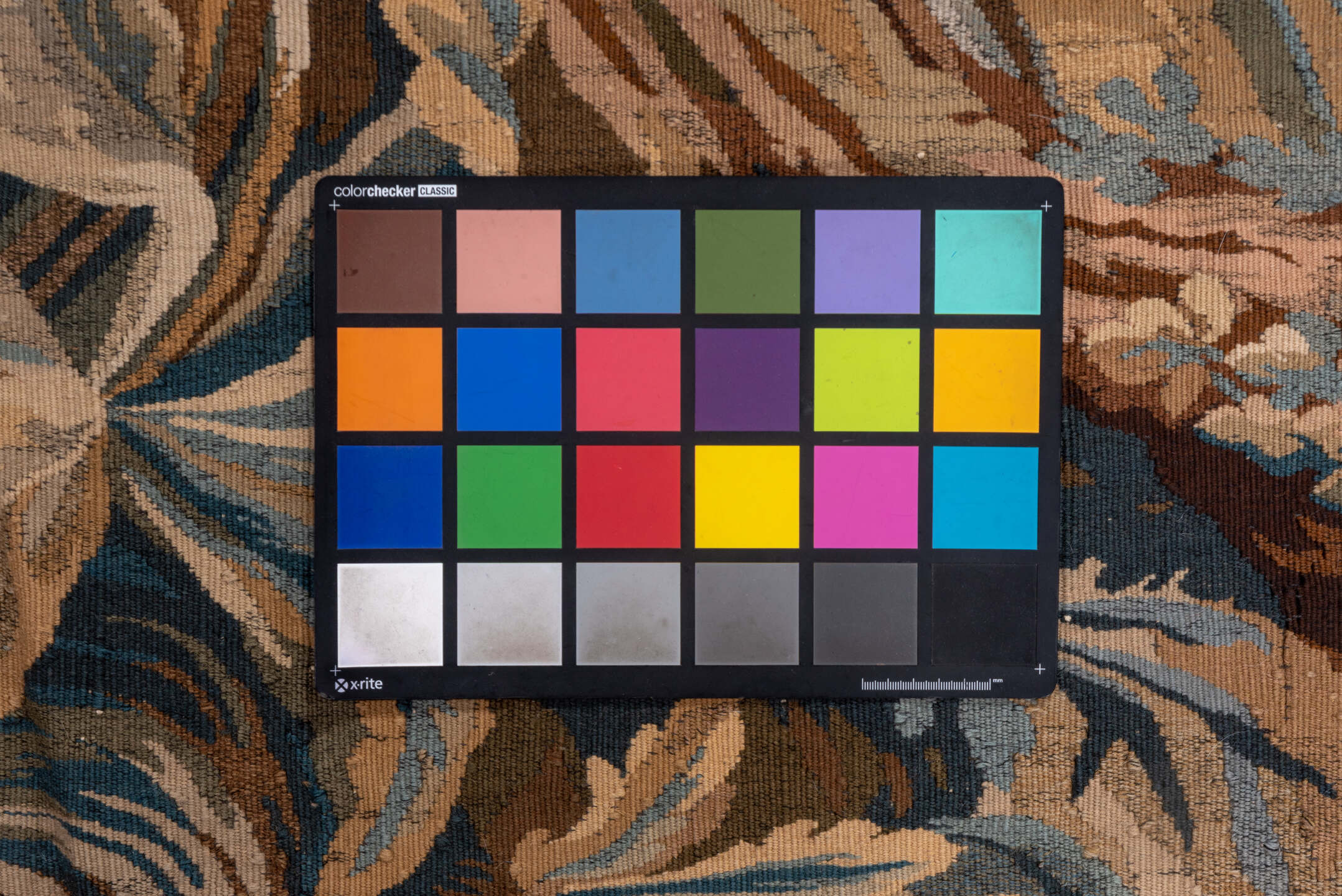 4' x 9' one-of-a-kind handmade vintage Tapestry runner rug. Color palette: black, brown, gray, light gray, pink