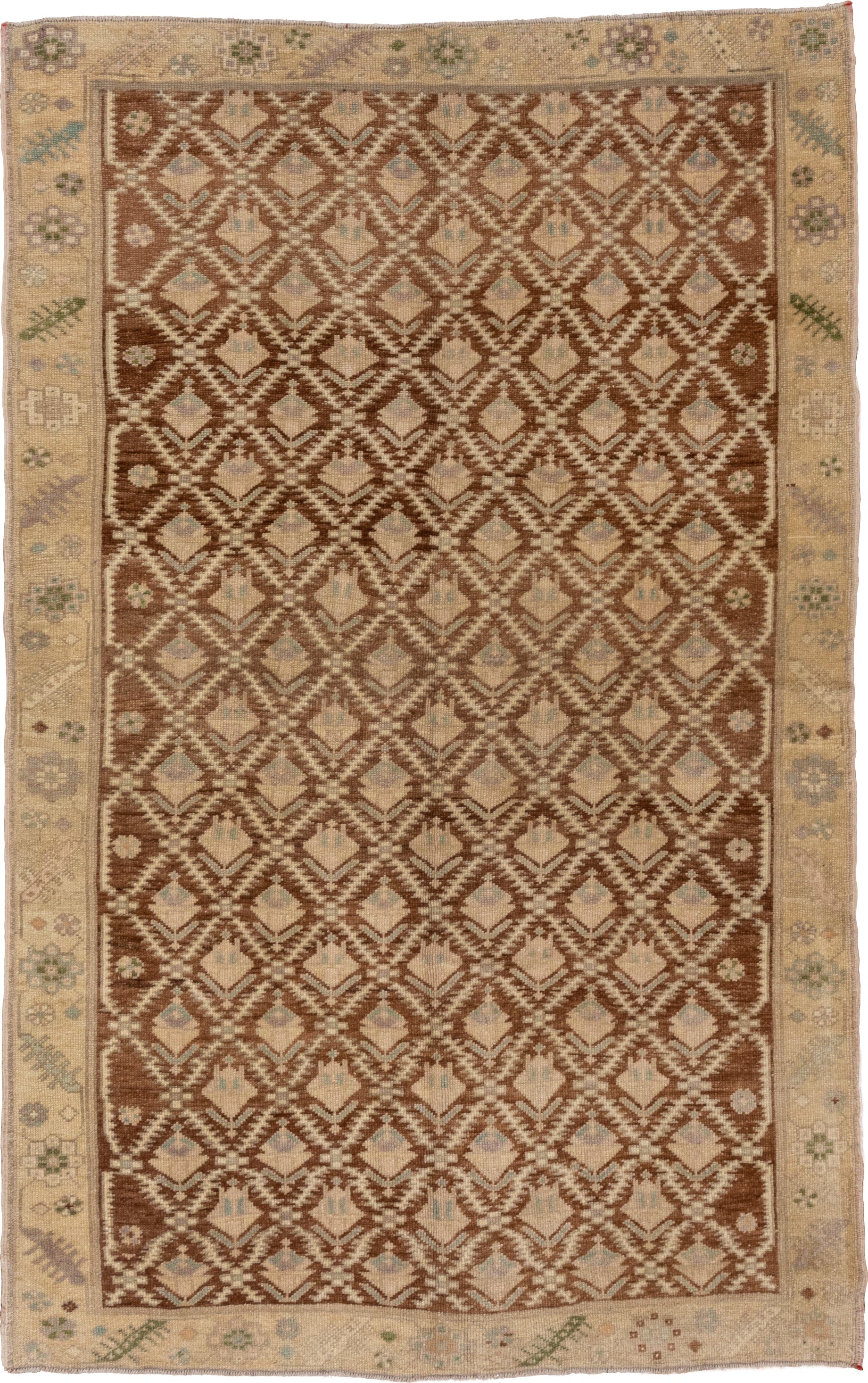 5' x 8' one-of-a-kind handmade vintage Oushak medium size rug. Color palette: brown, ivory, beige, sage, taupe, camel, green