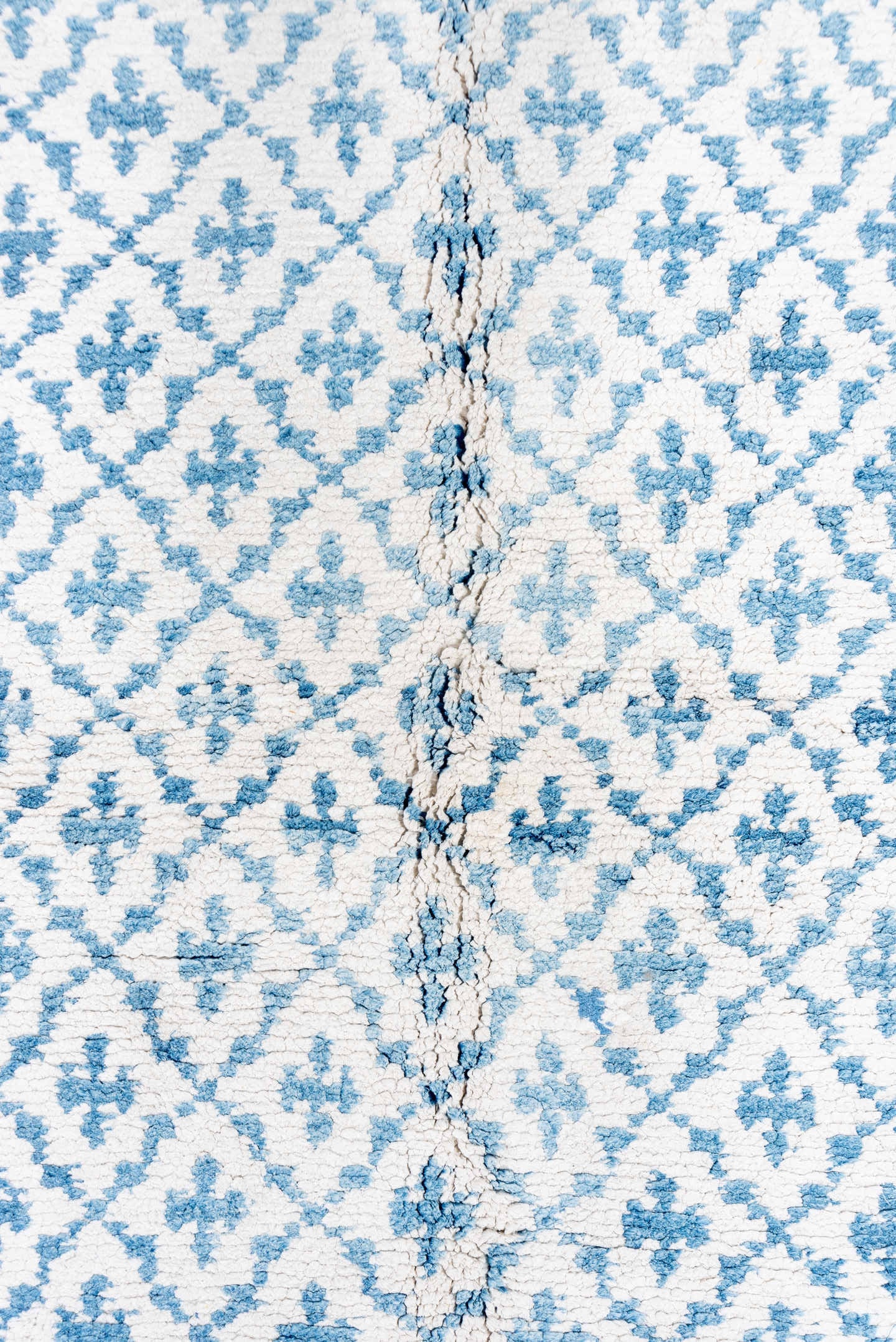 5' x 9' one-of-a-kind handmade vintage Cotton Agra medium size rug. Color palette: ivory, sky blue, powder blue, light blue