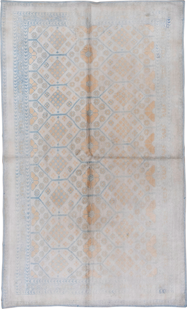 4' x 7' one-of-a-kind handmade vintage Cotton Agra rug. Color palette: ivory, pale blue, peach, sky blue, cream, taupe