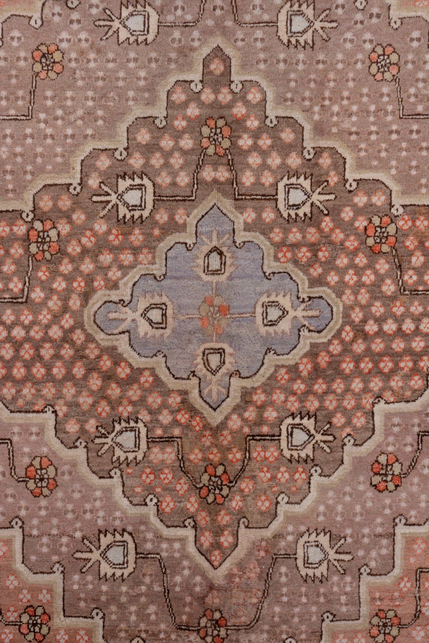 5' x 10' one-of-a-kind handmade vintage Khotan medium size rug. Color palette: rose, taupe, lavender, terra cotta, ivory