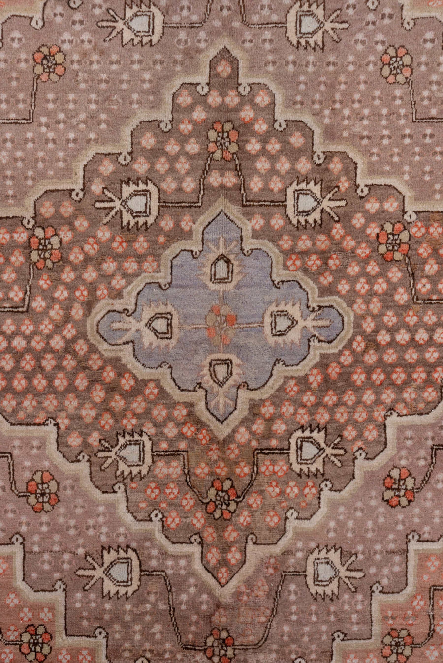 5' x 10' one-of-a-kind handmade vintage Khotan medium size rug. Color palette: rose, taupe, lavender, terra cotta, ivory