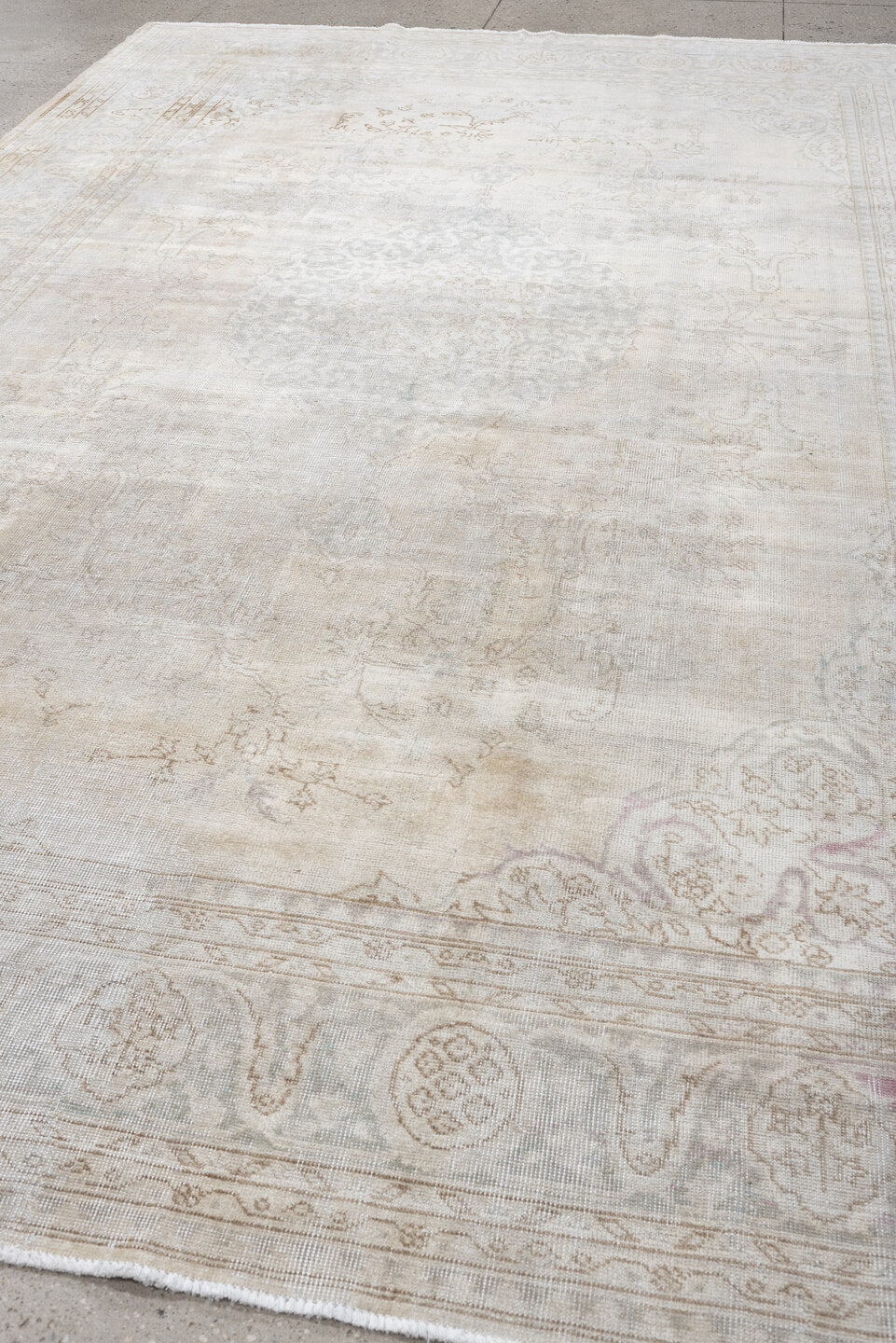 8' x 12' one-of-a-kind handmade vintage Sparta large size rug. Color palette: ivory, taupe, powder blue, cream, pale gray