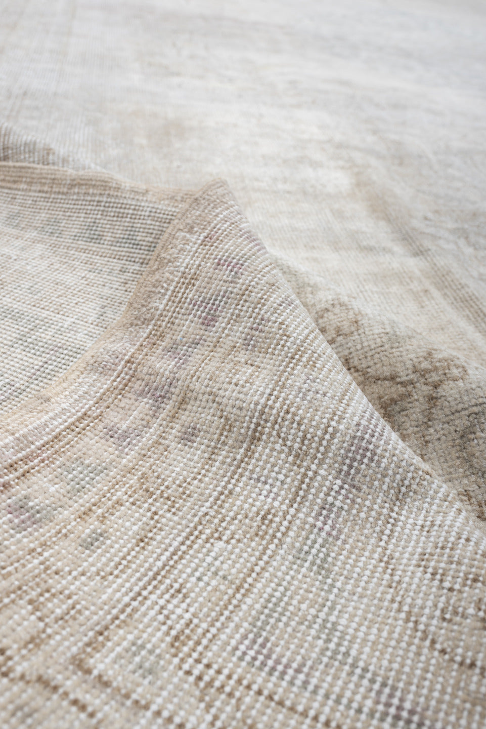 8' x 12' one-of-a-kind handmade vintage Sparta large size rug. Color palette: ivory, taupe, powder blue, cream, pale gray