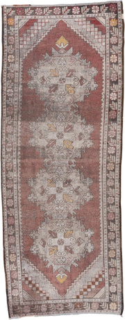 3' x 9' one-of-a-kind handmade vintage Oushak runner rug. Color palette: terra cotta, ivory, taupe, charcoal, gold, rose