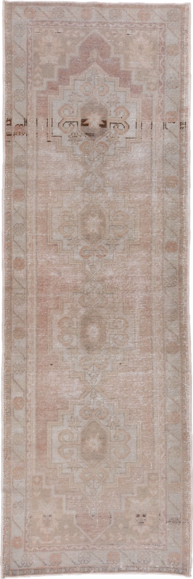 3' x 9' one-of-a-kind handmade vintage Oushak runner rug. Color palette: blush, ivory, taupe, beige, camel, charcoal, pink
