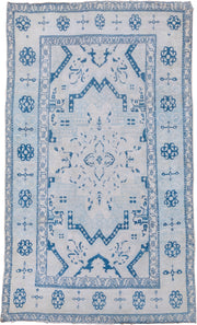 4' x 7' one-of-a-kind handmade vintage Cotton Agra rug. Color palette: ivory, sky blue, powder blue, denim blue, light blue