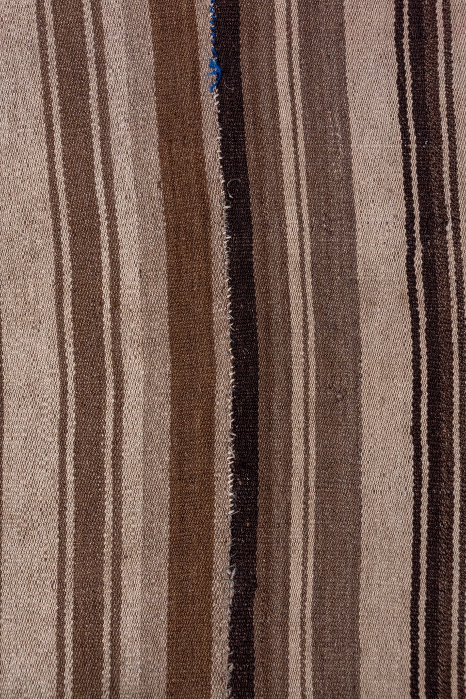 4' x 8' one-of-a-kind handmade vintage Kilim rug. Color palette: brown, taupe, camel, ivory, charcoal, slate, navy, beige