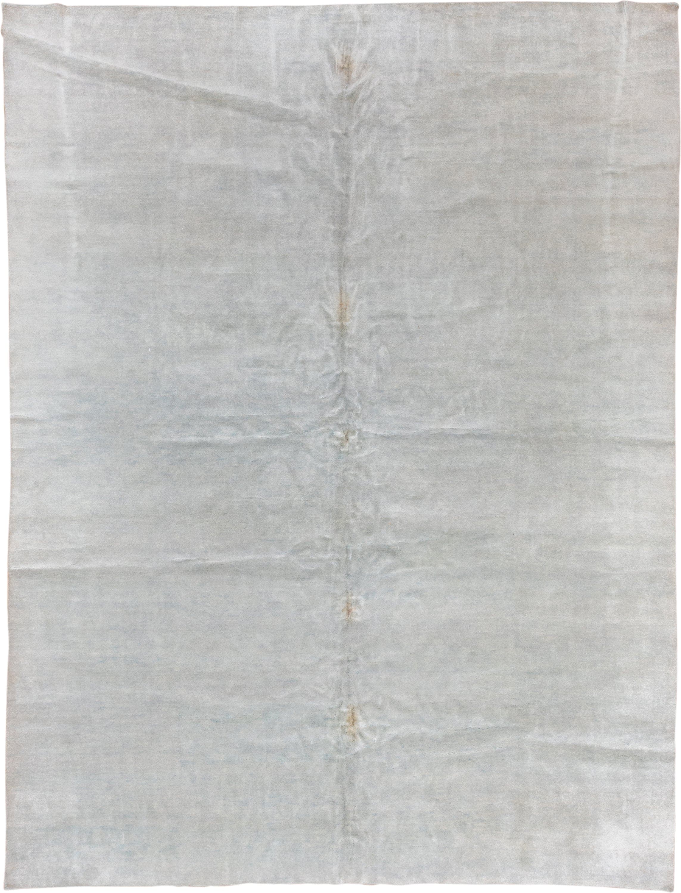 9' x 12' one-of-a-kind handmade vintage Rad large size rug. Color palette: ivory, pale blue, cream, taupe, light blue, beige