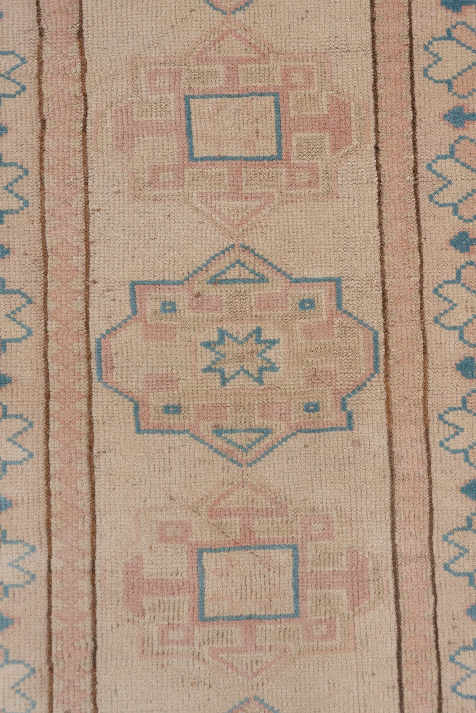 2' x 11' one-of-a-kind handmade vintage Oushak runner rug. Color palette: blush, ivory, pale blue, taupe, dusty rose, pink