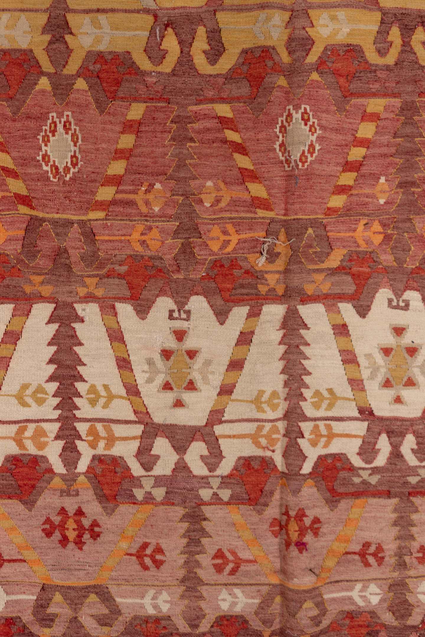 4' x 12' one-of-a-kind handmade vintage Kilim runner rug. Color palette: terra cotta, rust, rose, ivory, gold, sienna, camel