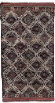 4' x 8' one-of-a-kind handmade vintage Jijim rug. Color palette: charcoal, ivory, rust, olive, taupe, rose, slate, gray