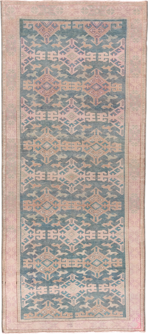 4' x 11' one-of-a-kind handmade vintage Oushak runner rug. Color palette: blue, blush, ivory, taupe, sage, pink, beige, gray
