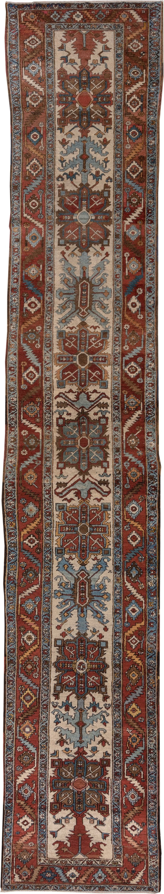3' x 17' one-of-a-kind handmade vintage Serapi runner rug. Color palette: rust, ivory, sky blue, navy, camel, brown