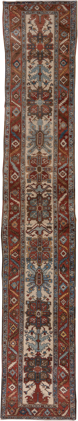 3' x 17' one-of-a-kind handmade vintage Serapi runner rug. Color palette: rust, ivory, sky blue, navy, camel, brown