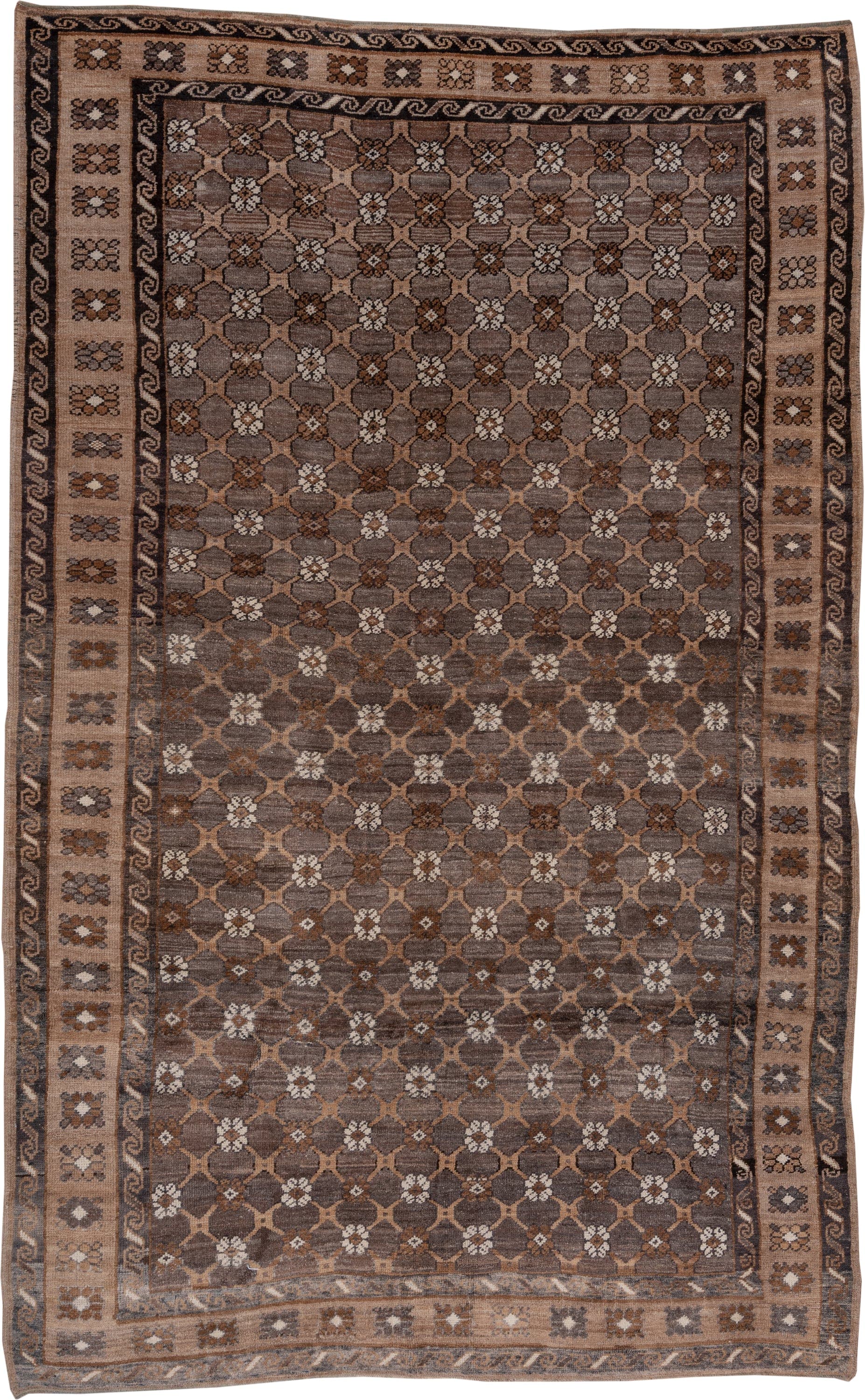 7' x 11' one-of-a-kind handmade antique Kars large size rug. Color palette: taupe, brown, camel, ivory, charcoal, beige