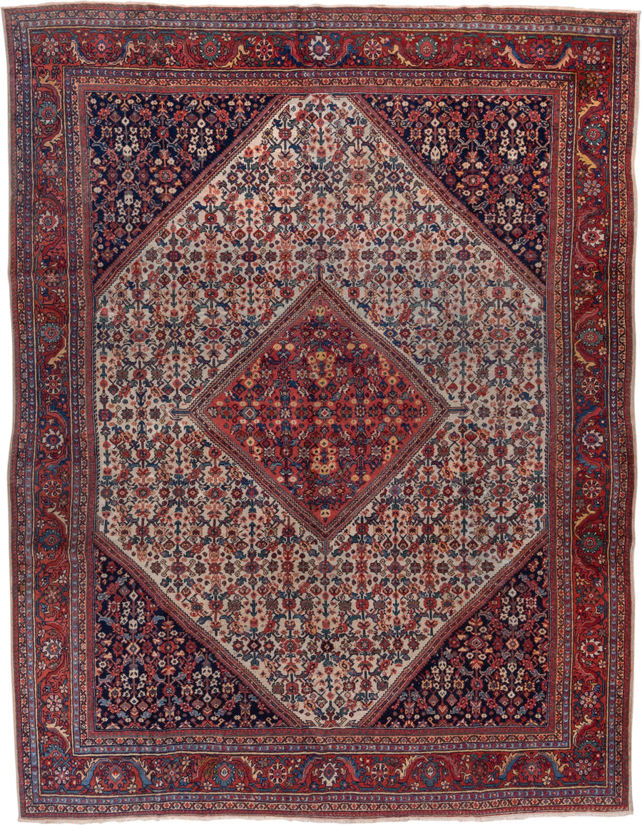 9' x 11' one-of-a-kind handmade antique Farahan large size rug. Color palette: ivory, rust, navy, crimson, indigo, camel
