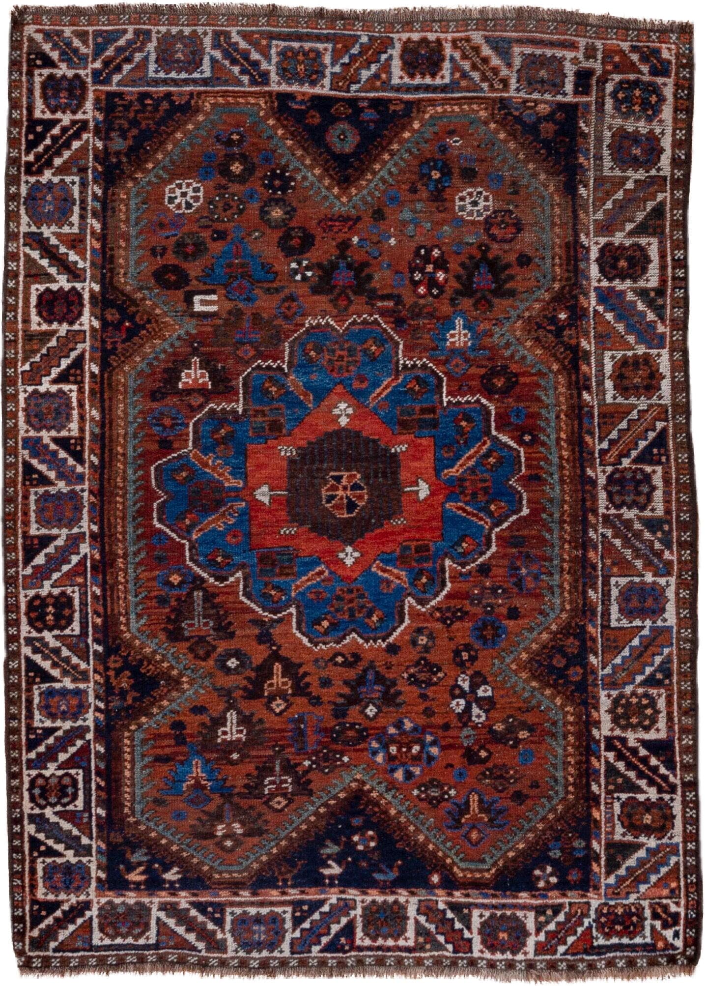 3' x 5' one-of-a-kind handmade antique Shiraz small size rug. Color palette: rust, indigo, ivory, sky blue, brown, charcoal