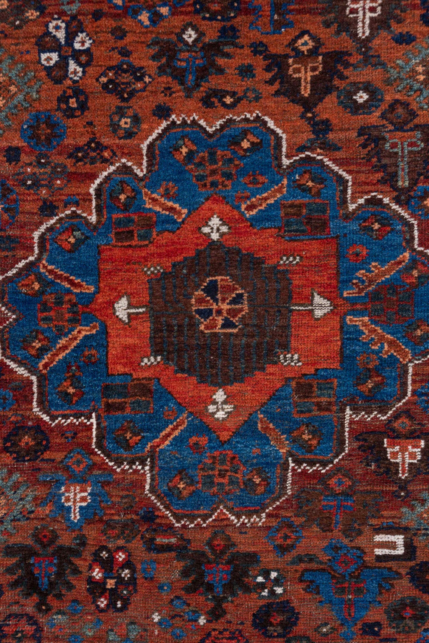 3' x 5' one-of-a-kind handmade antique Shiraz small size rug. Color palette: rust, indigo, ivory, sky blue, brown, charcoal