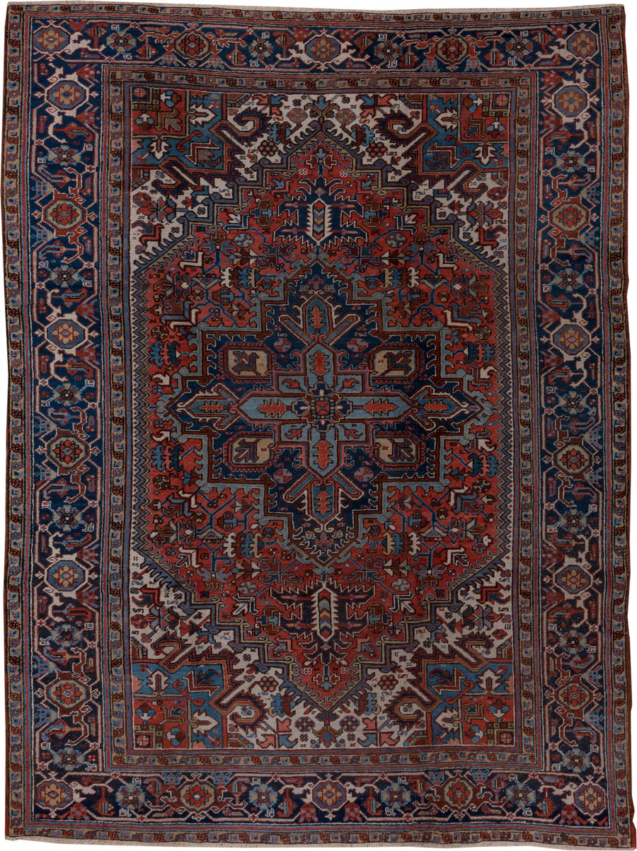 8' x 11' one-of-a-kind handmade antique Heriz large size rug. Color palette: rust, navy, ivory, sky blue, slate, camel