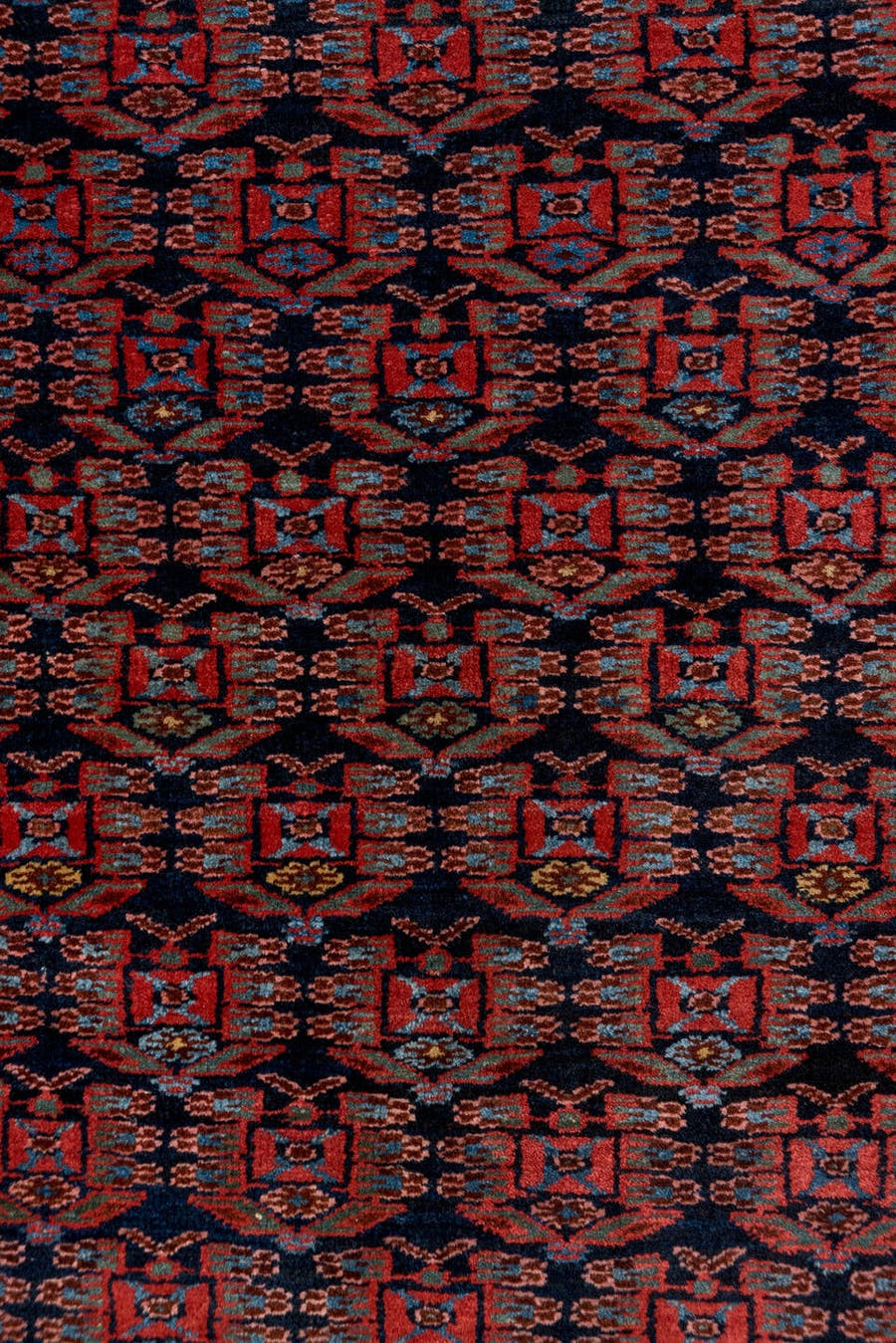 3' x 6' one-of-a-kind handmade antique Kurd small size rug. Color palette: navy, rust, brick, sky blue, crimson, ivory