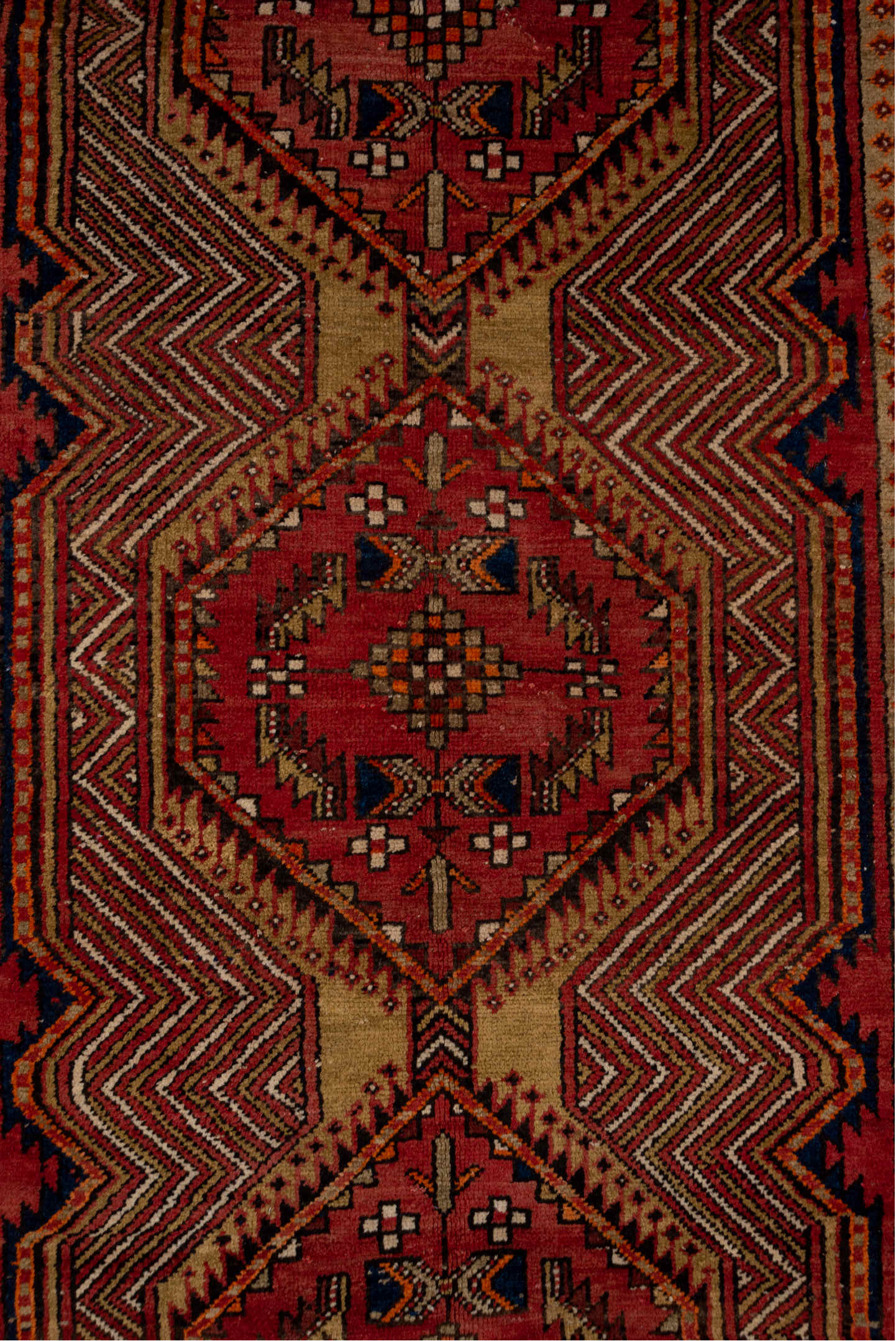 4' x 11' one-of-a-kind handmade antique Sarab runner rug. Color palette: rust, ivory, brick, navy, camel, burgundy