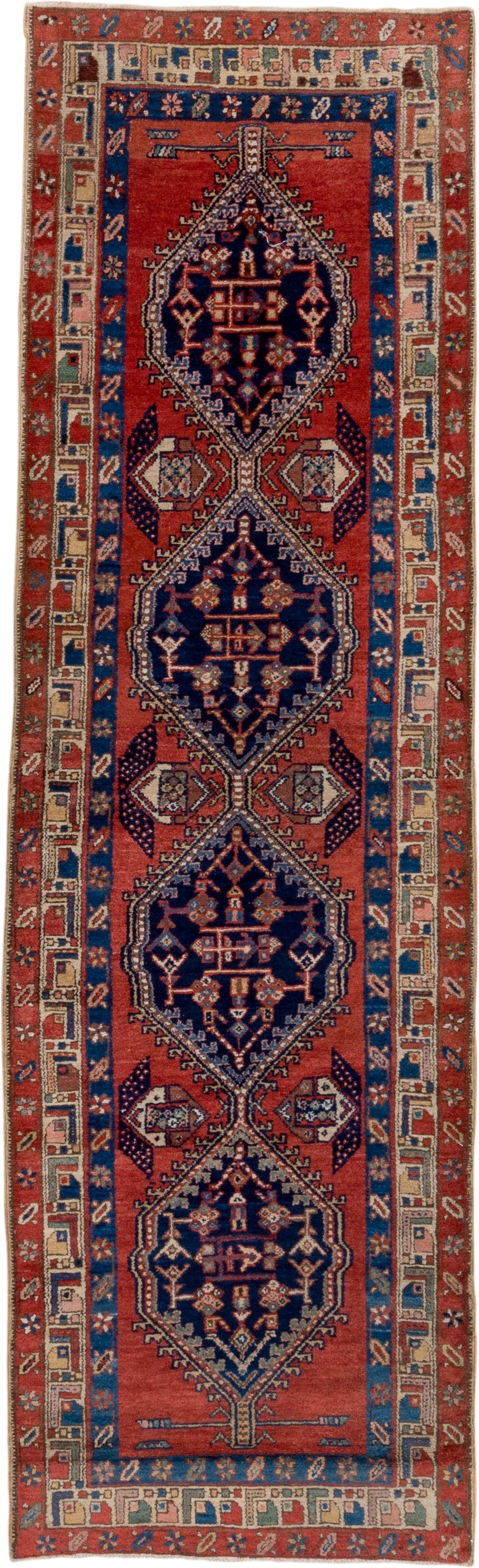 3' x 9' one-of-a-kind handmade vintage Heriz runner rug. Color palette: rust, navy, ivory, cobalt, camel, rose, terracotta
