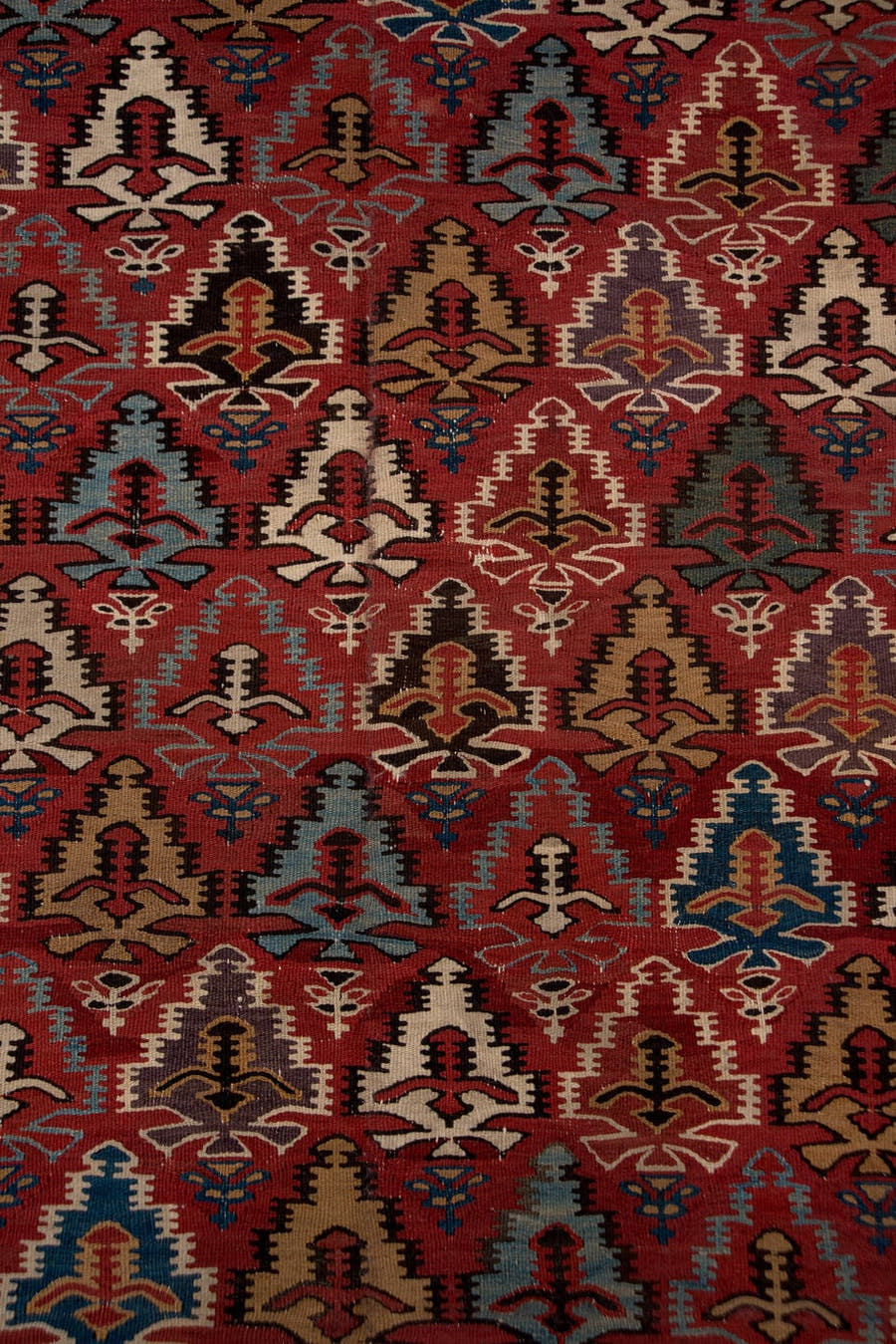 5' x 13' one-of-a-kind handmade antique Kilim rug. Color palette: rust, ivory, indigo, camel, charcoal, sky blue, burgundy
