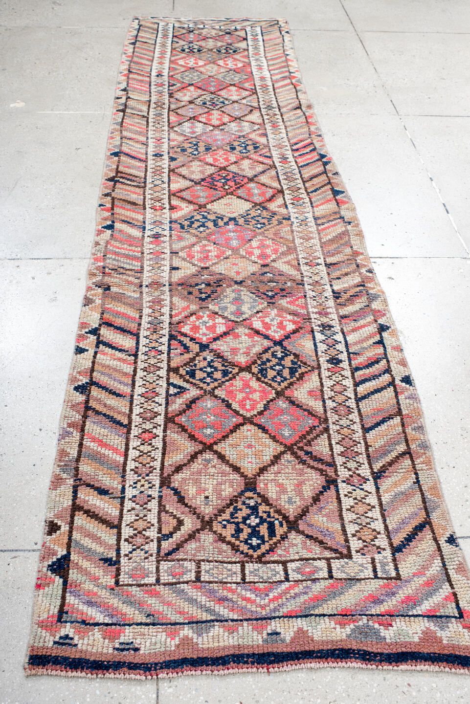 2' x 10' one-of-a-kind handmade vintage Oushak runner rug. Color palette: blue, brown, gray, indian red, light gray