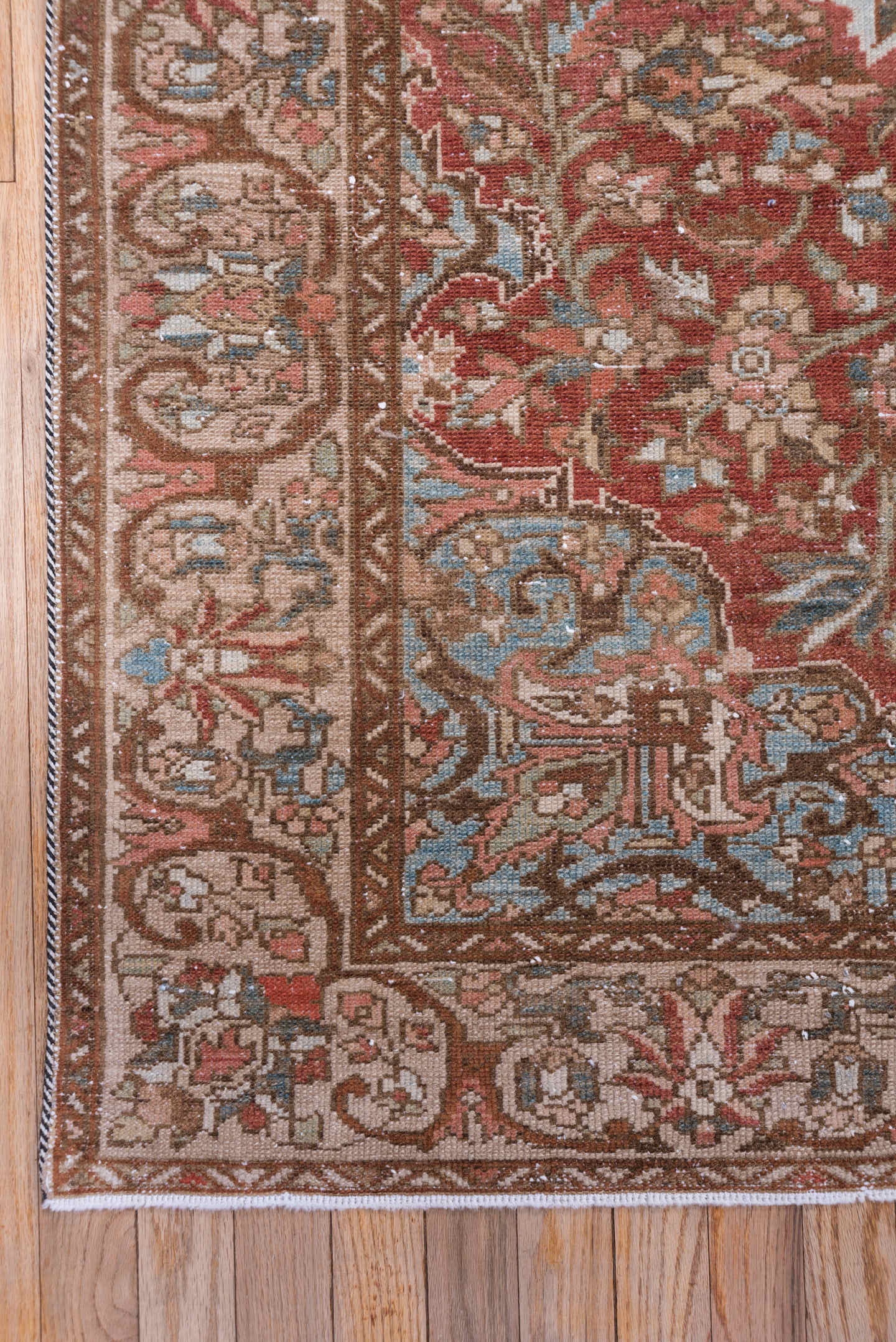 4' x 6' one-of-a-kind handmade vintage Baktiary small size rug. Color palette: rust, taupe, ivory, sky blue, brown, rose
