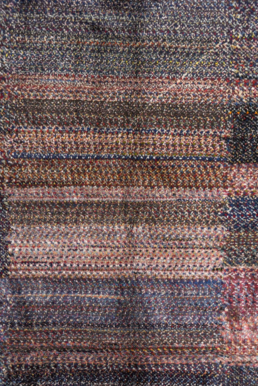 5' x 9' one-of-a-kind handmade vintage Sparta medium size rug. Color palette: indigo, plum, charcoal, rose, lavender, taupe