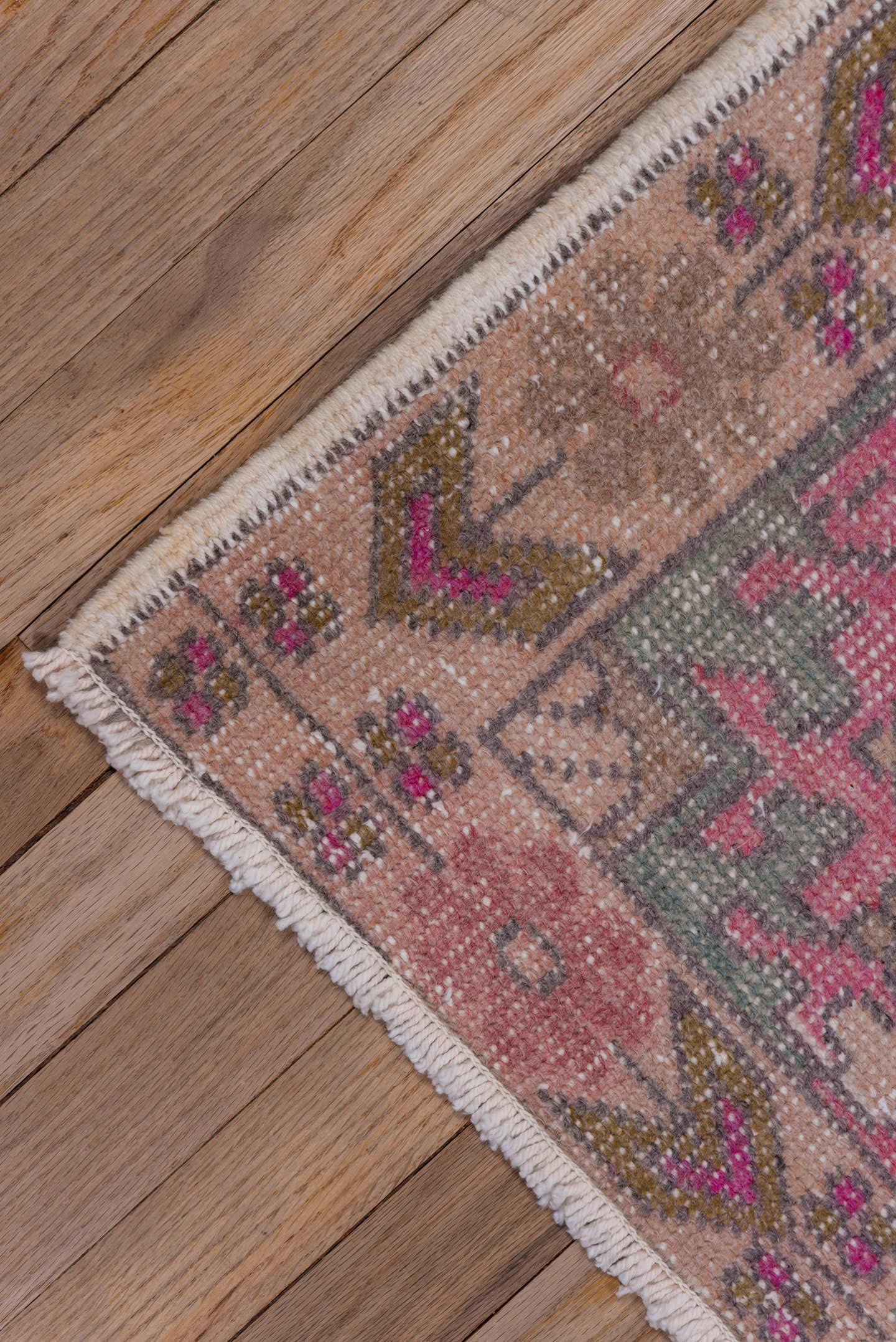 4' x 7' one-of-a-kind handmade vintage Oushak rug. Color palette: blush, ivory, dusty rose, pale blue, taupe, pink, sage