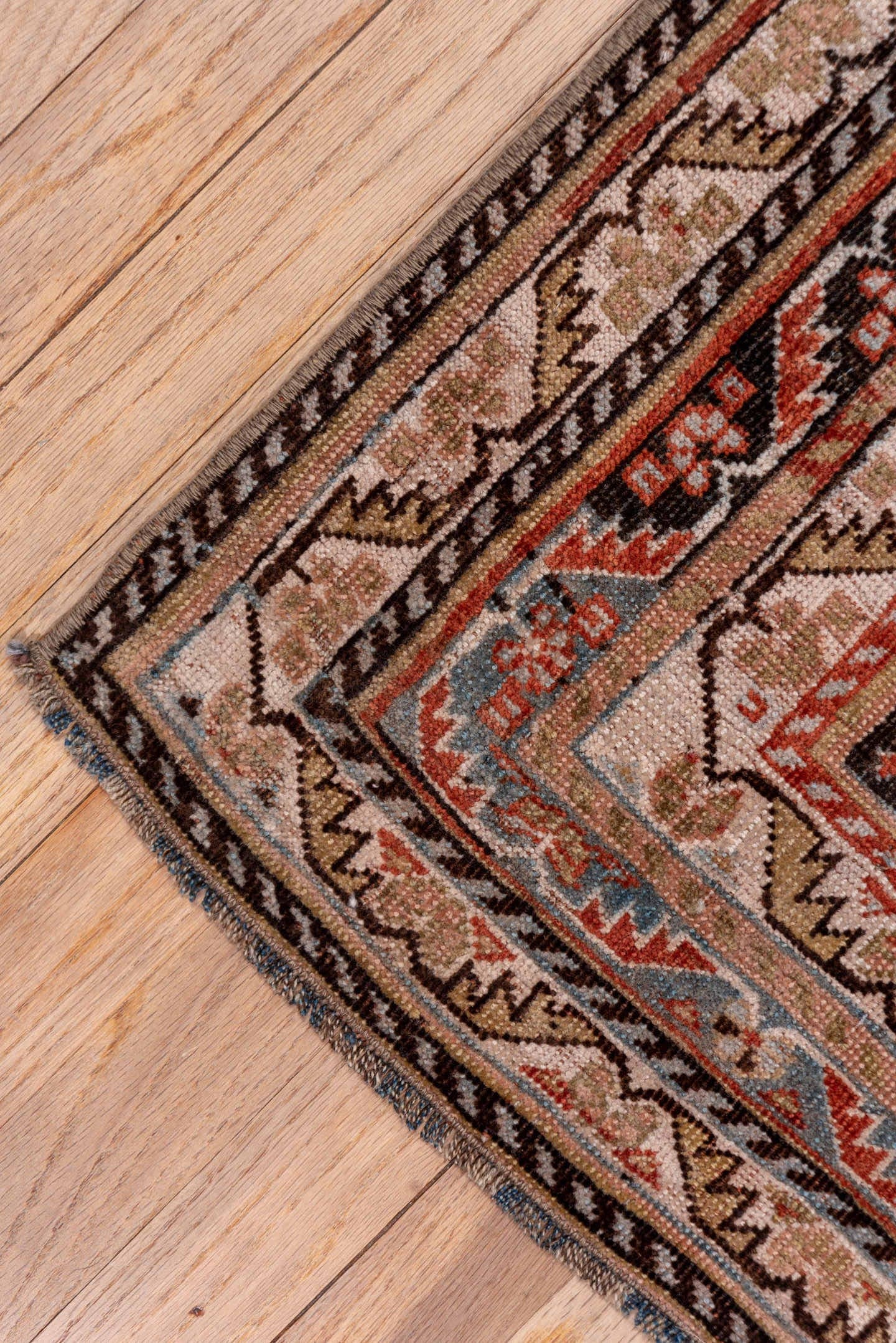 5' x 10' one-of-a-kind handmade antique Qashqai medium size rug. Color palette: ivory, charcoal, rust, slate, taupe, camel