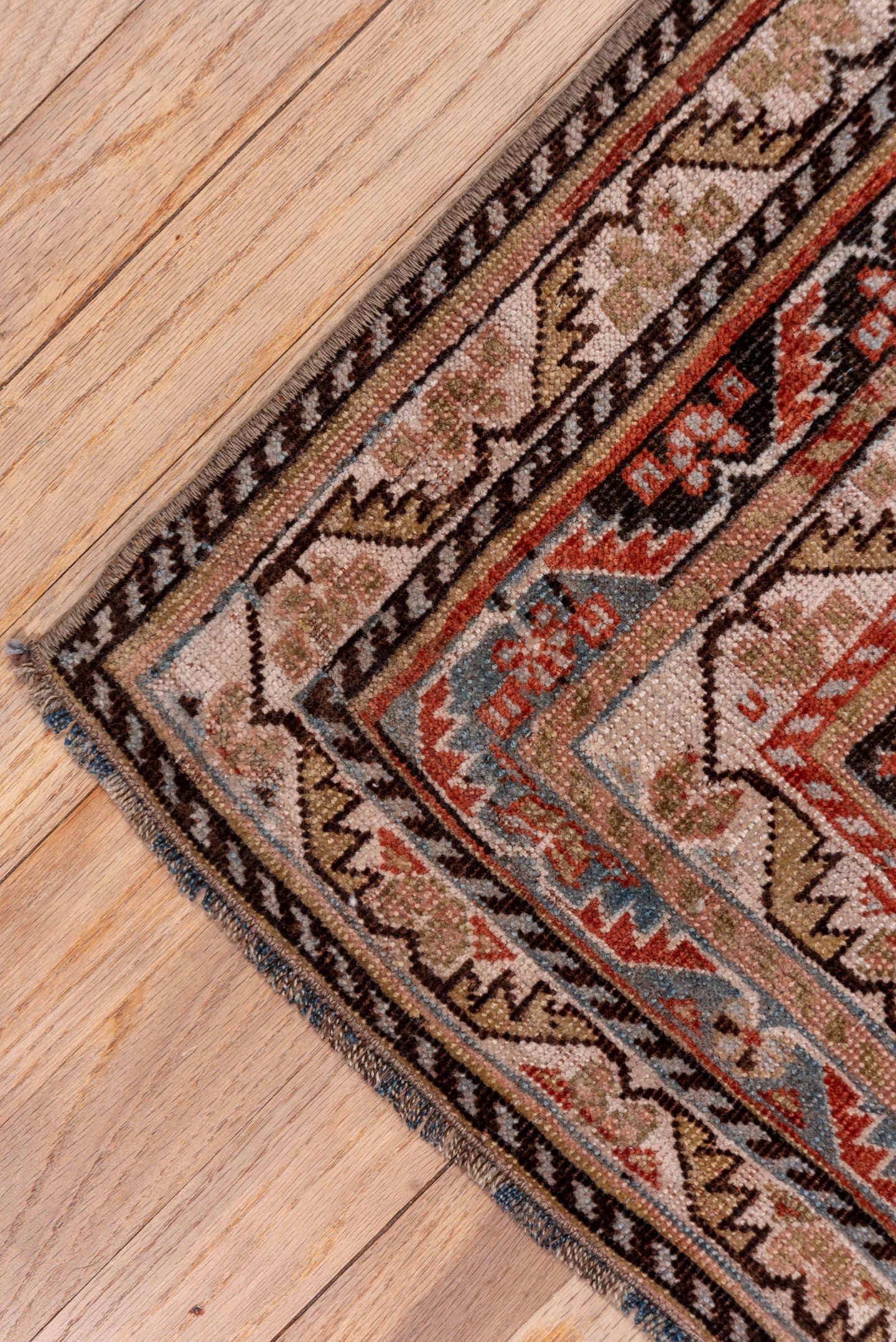 5' x 10' one-of-a-kind handmade antique Qashqai medium size rug. Color palette: ivory, charcoal, rust, slate, taupe, camel