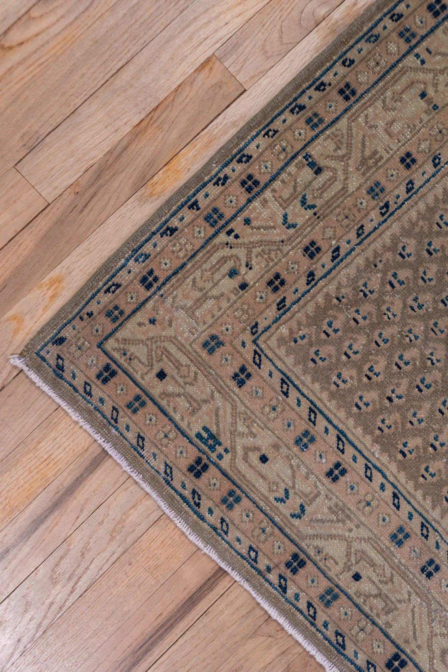 3' x 10' one-of-a-kind handmade vintage Mahal runner rug. Color palette: taupe, brown, beige, indigo, ivory, camel, gray