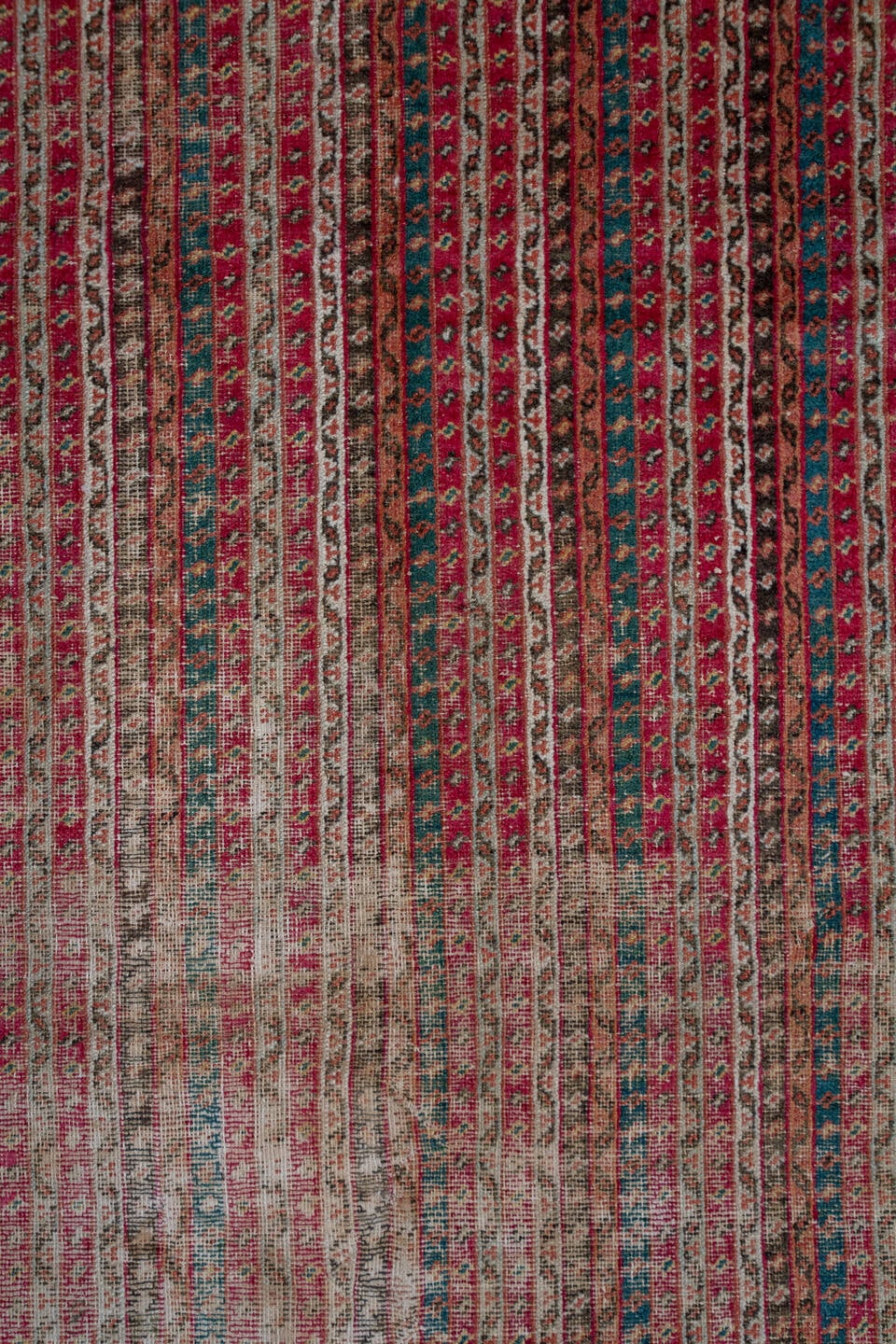 6' x 12' one-of-a-kind handmade antique Ghordes large size rug. Color palette: rust, brick, ivory, navy, rose, taupe