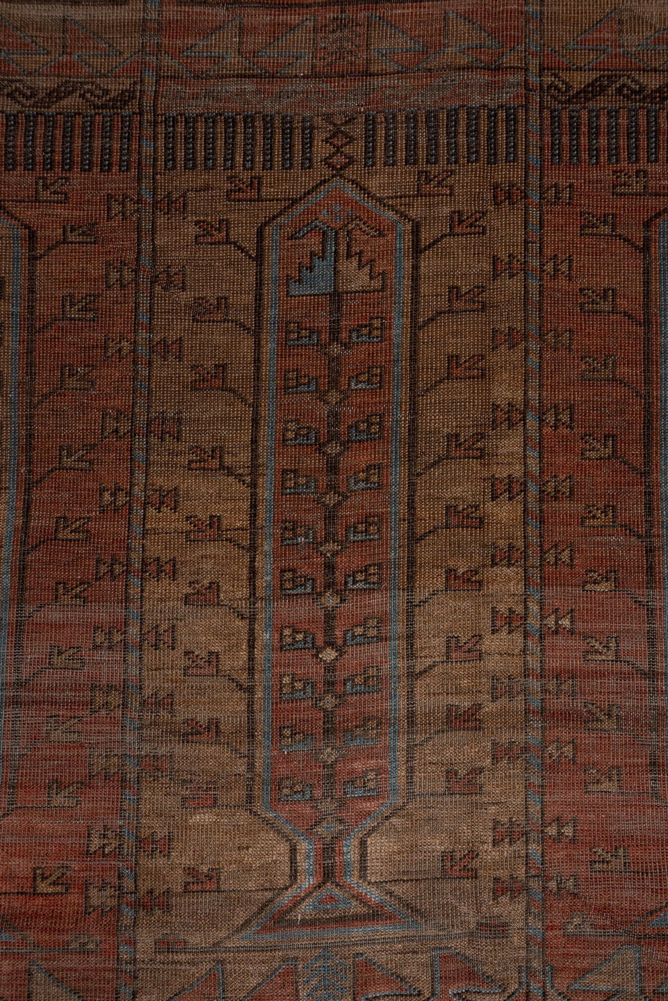 5' x 9' one-of-a-kind handmade antique Belouch large size rug. Color palette: rust, brown, slate, taupe, charcoal