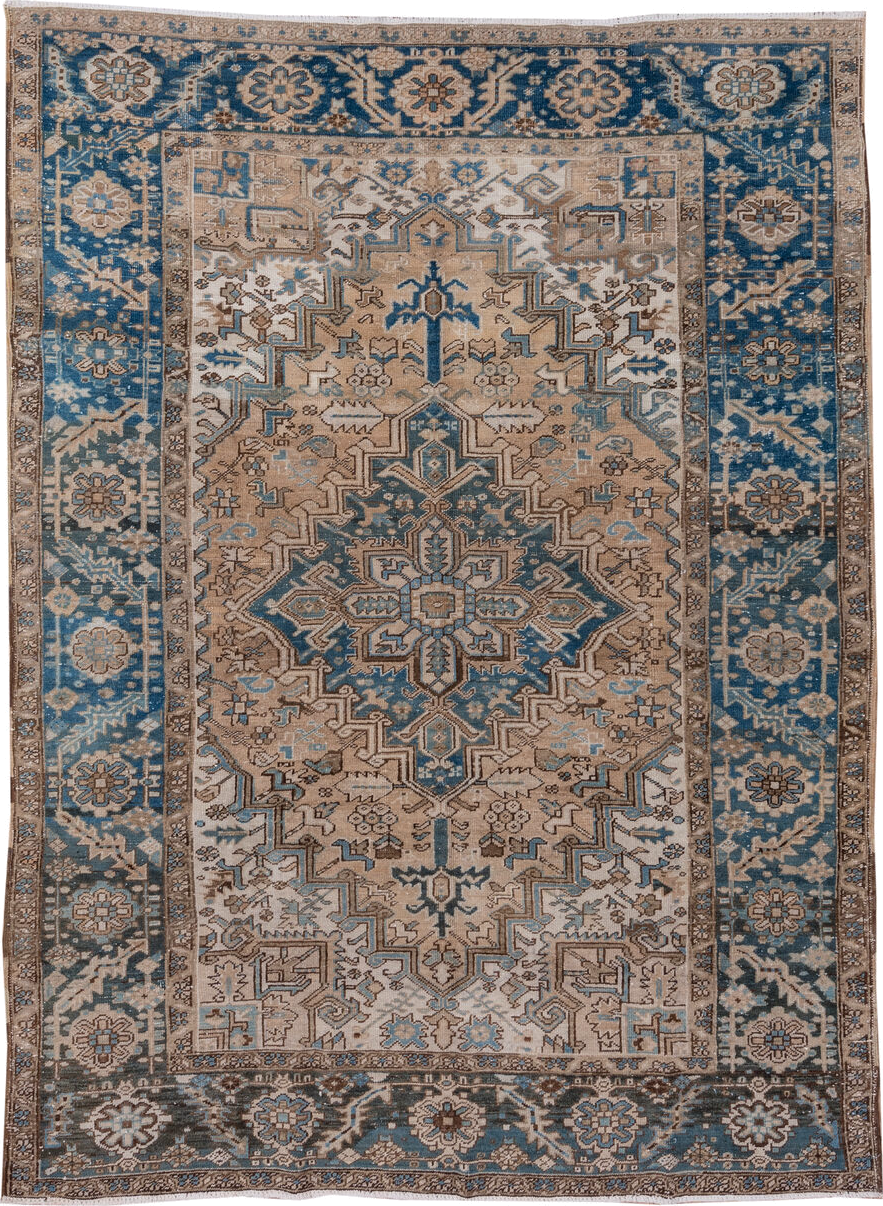6' x 9' one-of-a-kind handmade antique Heriz medium size rug. Color palette: ivory, blue, taupe, brown, sky blue, charcoal