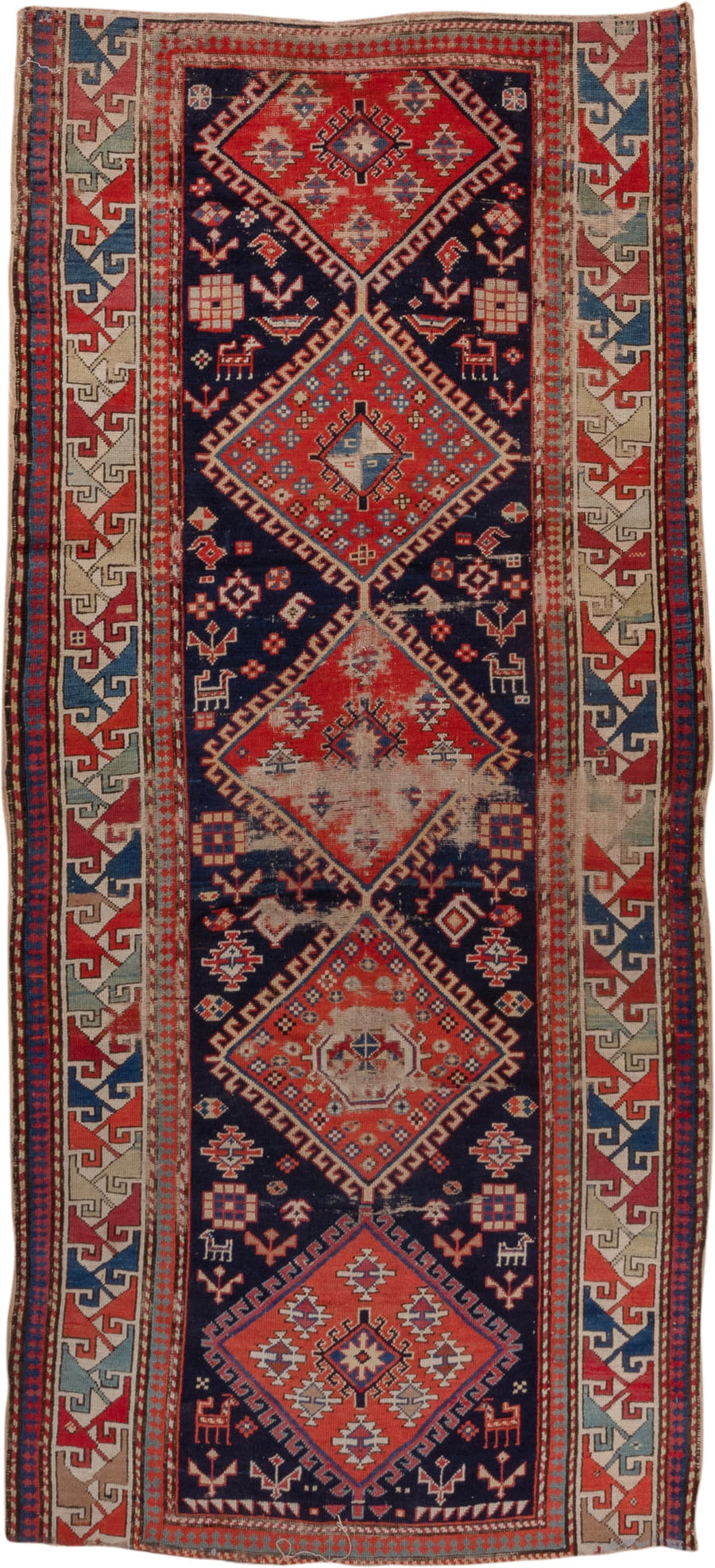 4' x 9' one-of-a-kind handmade vintage Shirvan runner rug. Color palette: navy, rust, ivory, sky blue, camel, red, slate